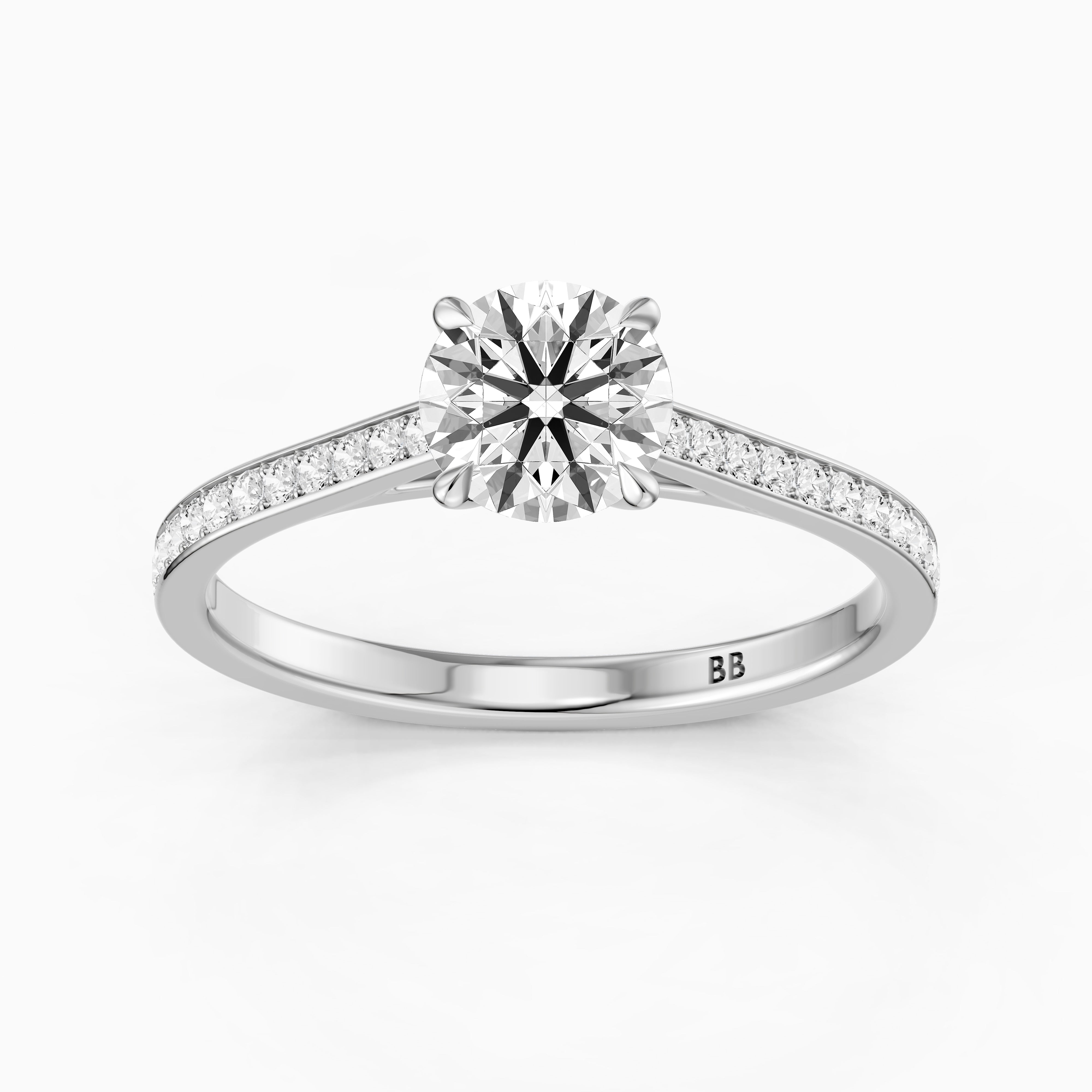 Callie 4 Prong Round Cut Side Stone Channel Set Moissanite Diamond Ring