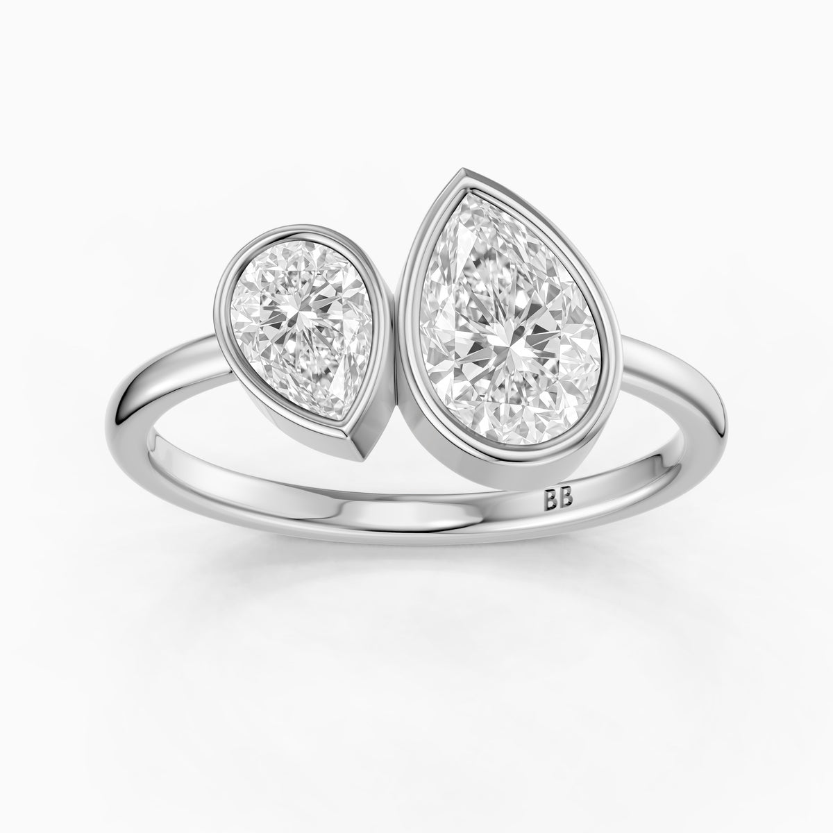 Nora Toi et Moi Pear Cut Moissanite Diamond Ring in Bezel Setting