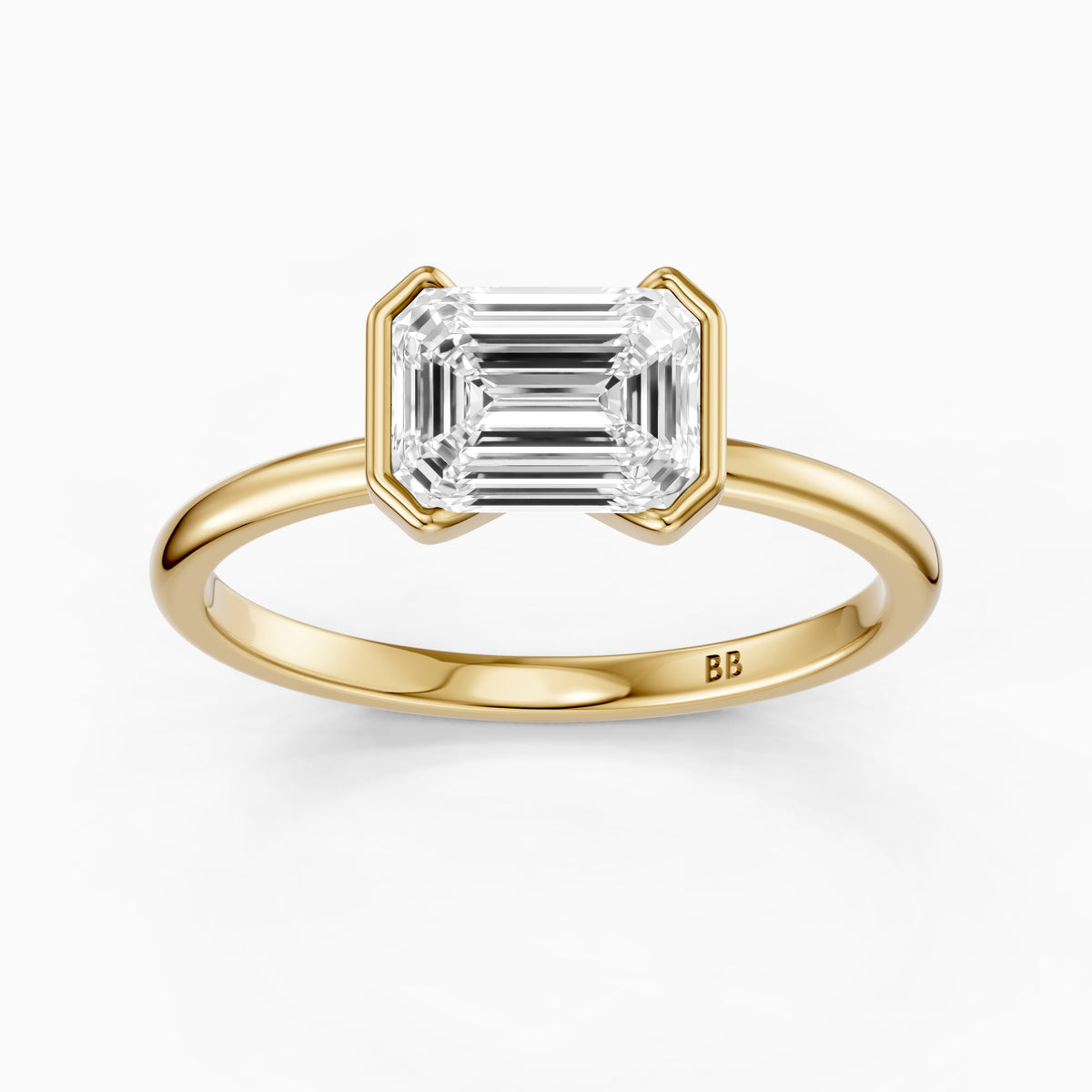 Kierra Emerald Half Bezel East West Moissanite Diamond Ring