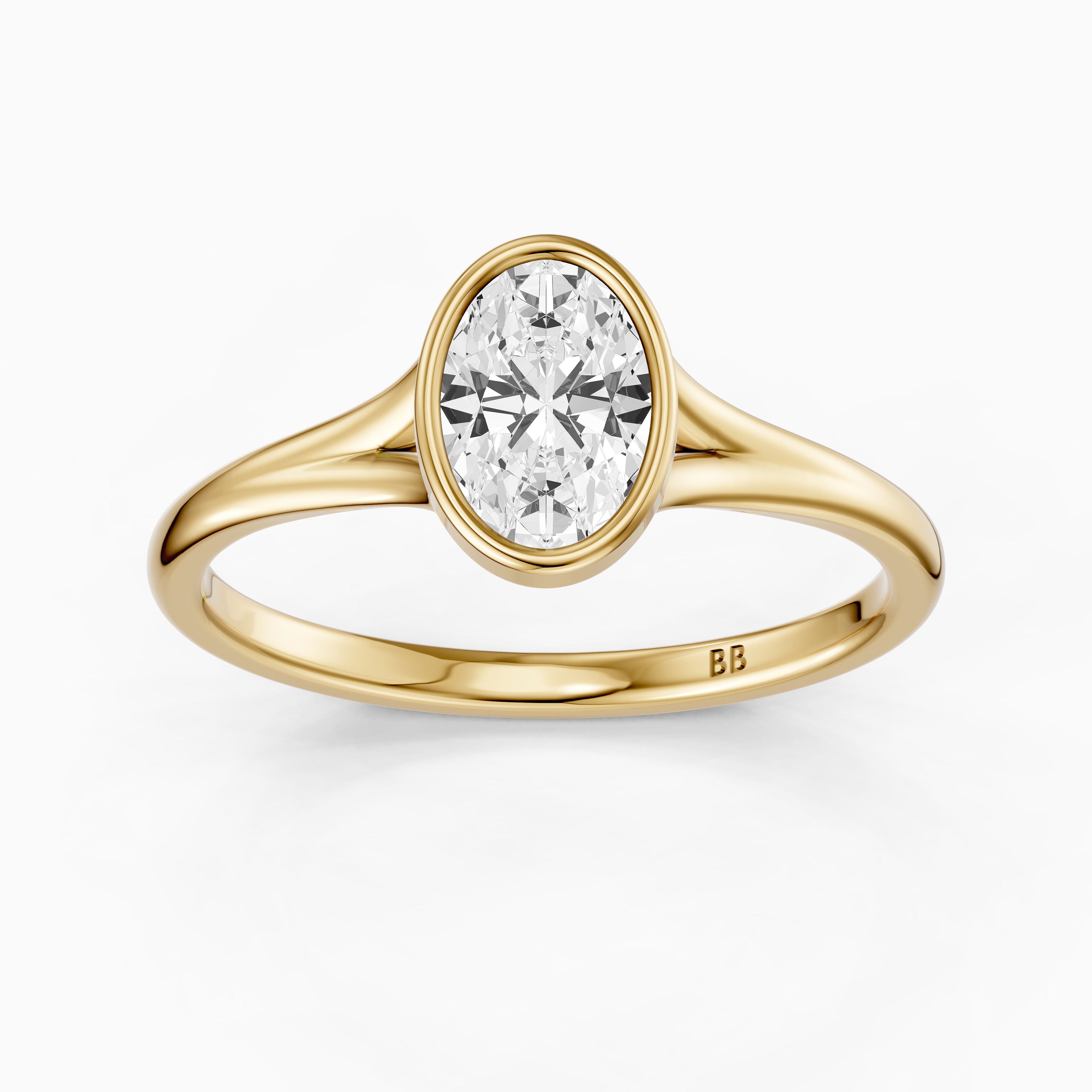 Ember Oval Cut Lab Grown Diamond Ring in Bezel Set Split Shank Style