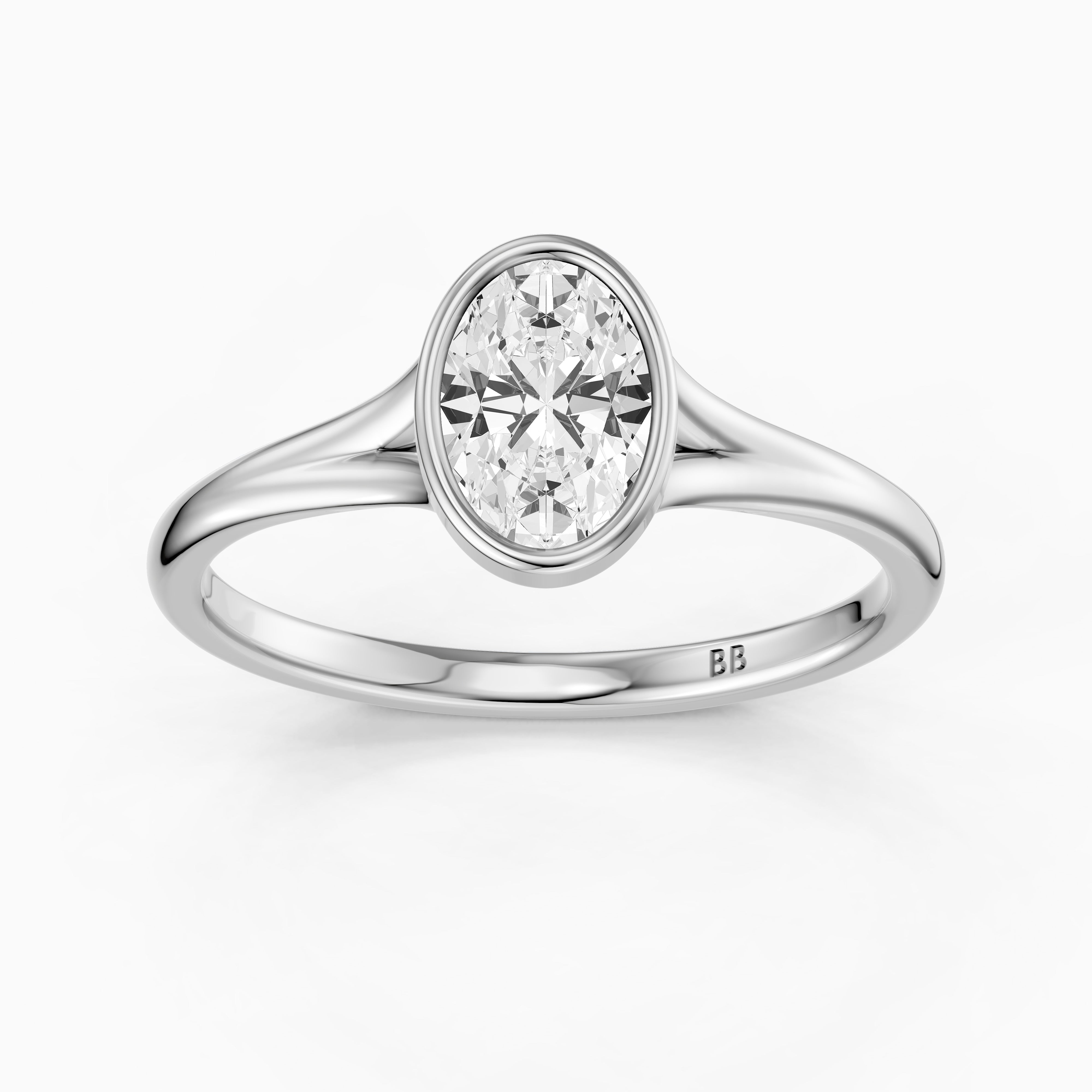 Ember Oval Cut Lab Grown Diamond Ring in Bezel Set Split Shank Style