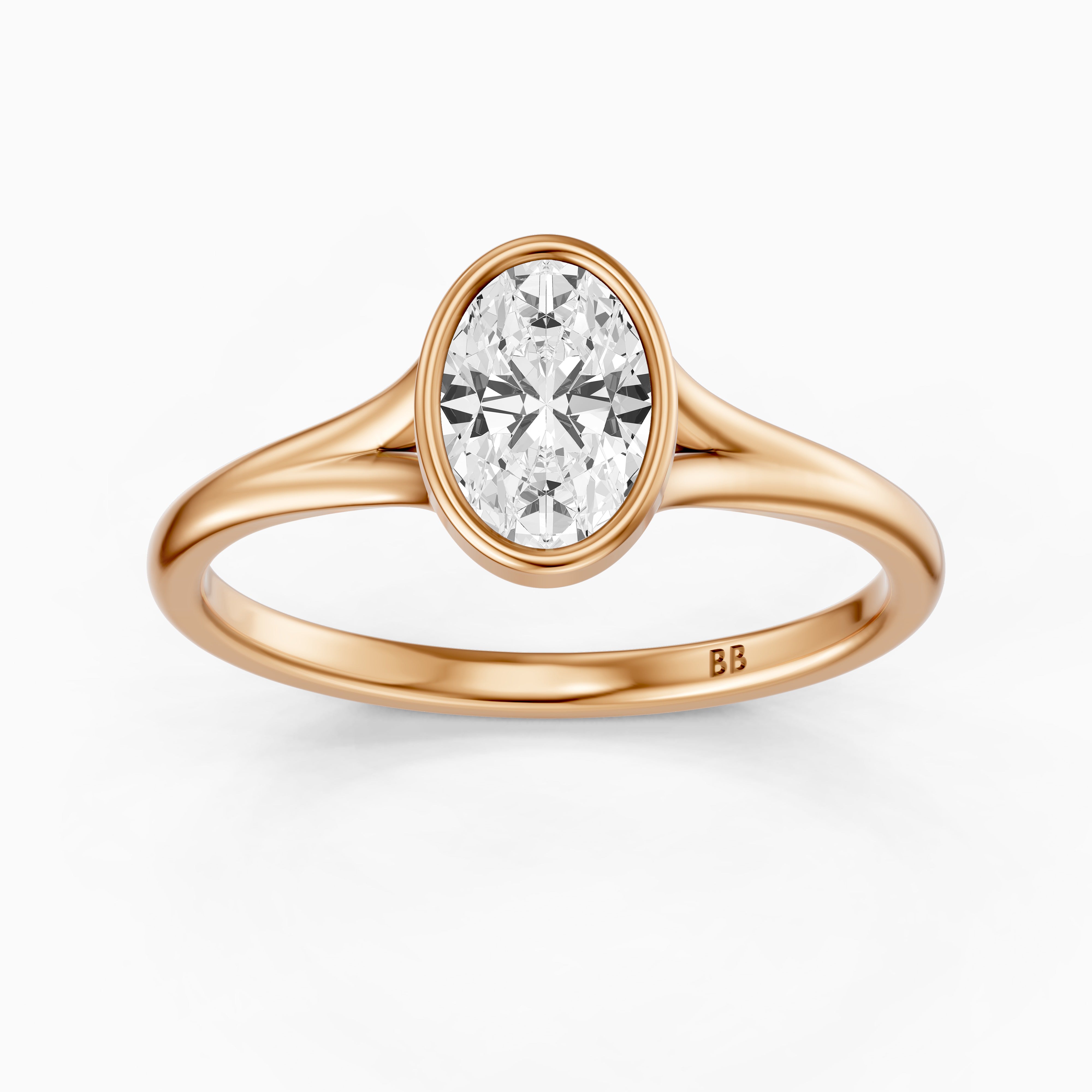 Ember Oval Cut Lab Grown Diamond Ring in Bezel Set Split Shank Style