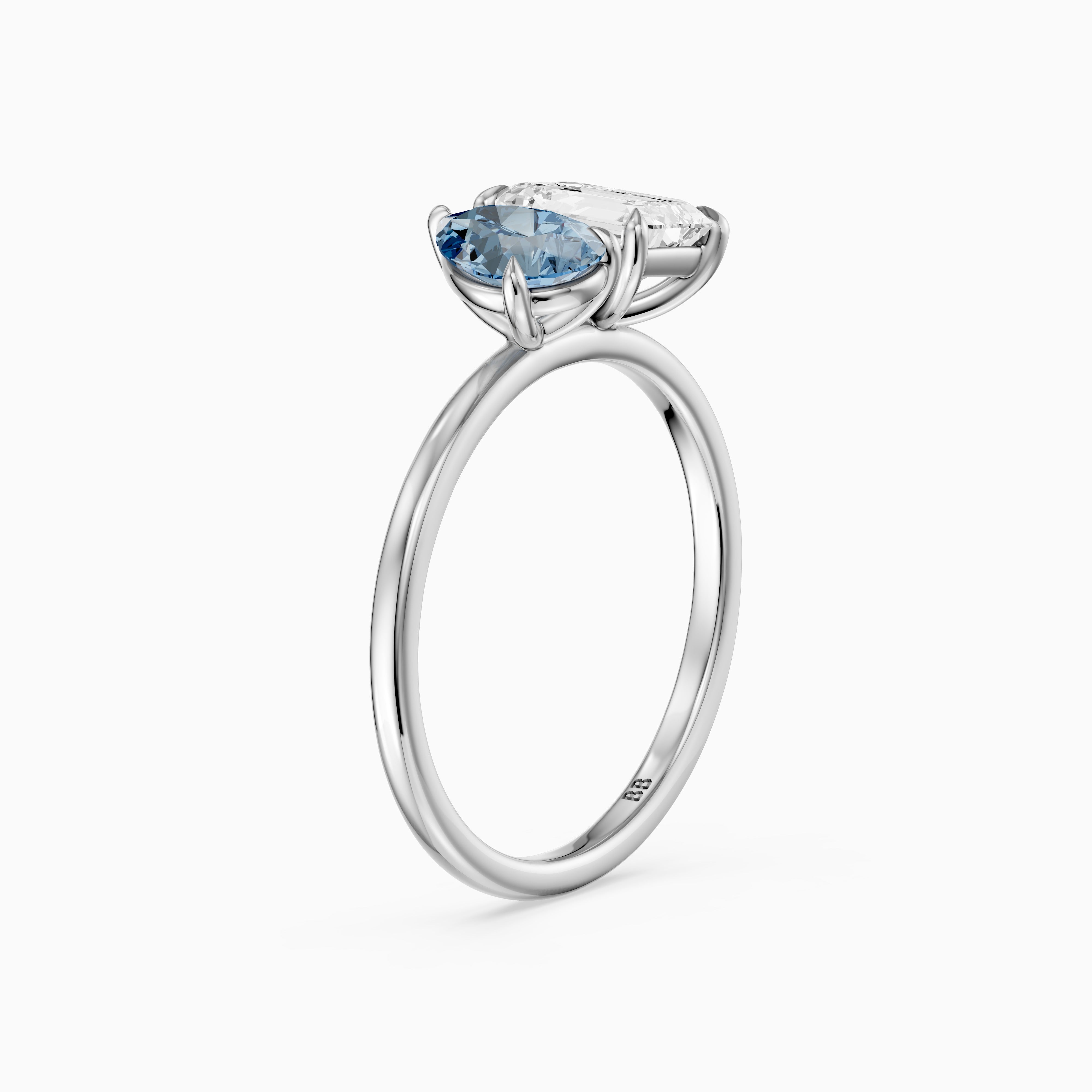 Eliska Blue Pear and Emerald Cut Color Lab Grown Diamond Toi et Moi Ring