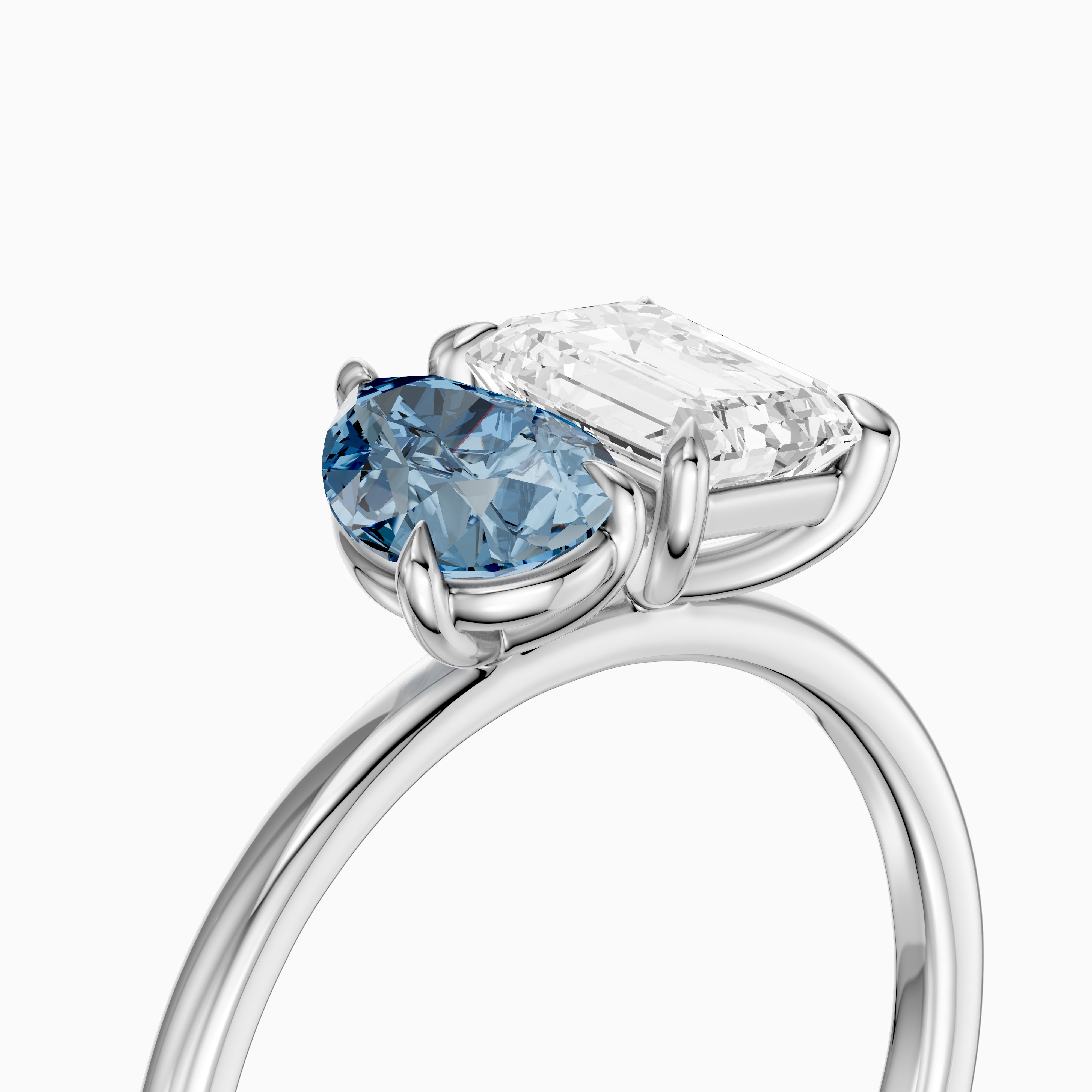 Eliska Blue Pear and Emerald Cut Color Lab Grown Diamond Toi et Moi Ring