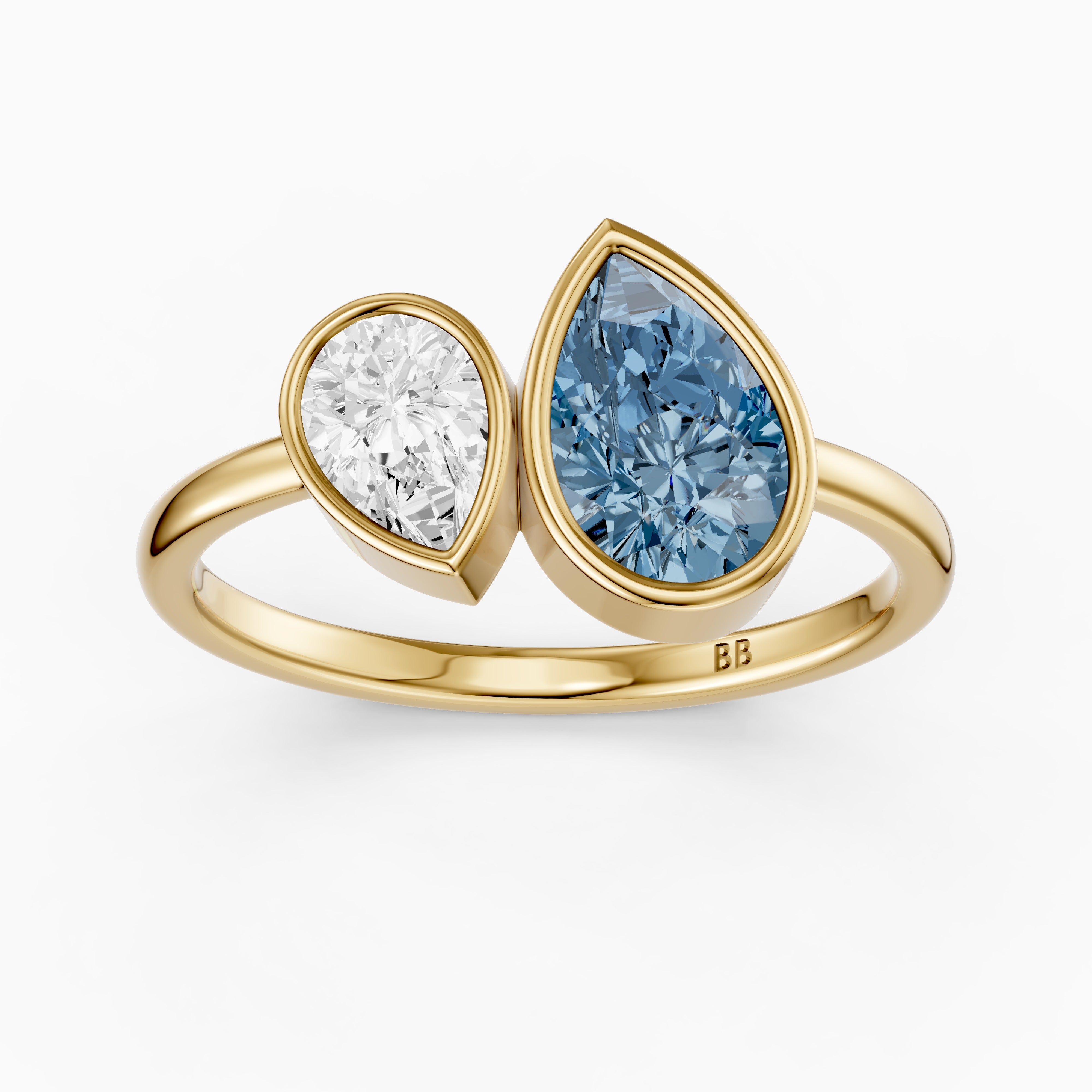 Nicolina Blue and White Pear Cut Colored Lab Grown Diamond Toi et Moi Bezel Ring