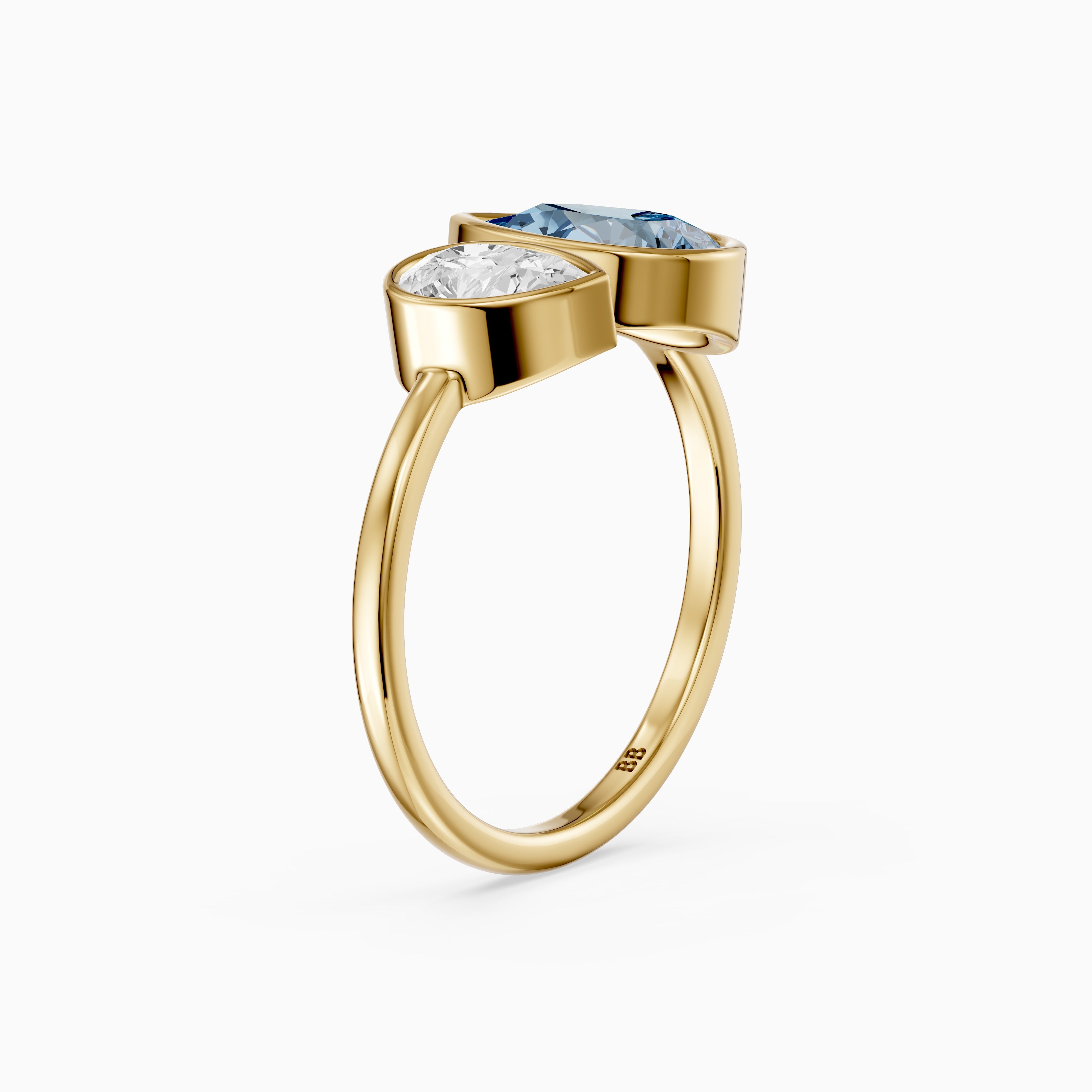 Nicolina Blue and White Pear Cut Colored Lab Grown Diamond Toi et Moi Bezel Ring