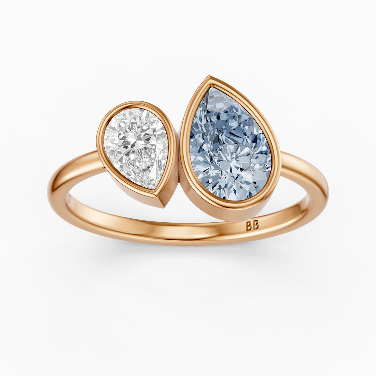 Nicolina Blue and White Pear Cut Colored Lab Grown Diamond Toi et Moi Bezel Ring