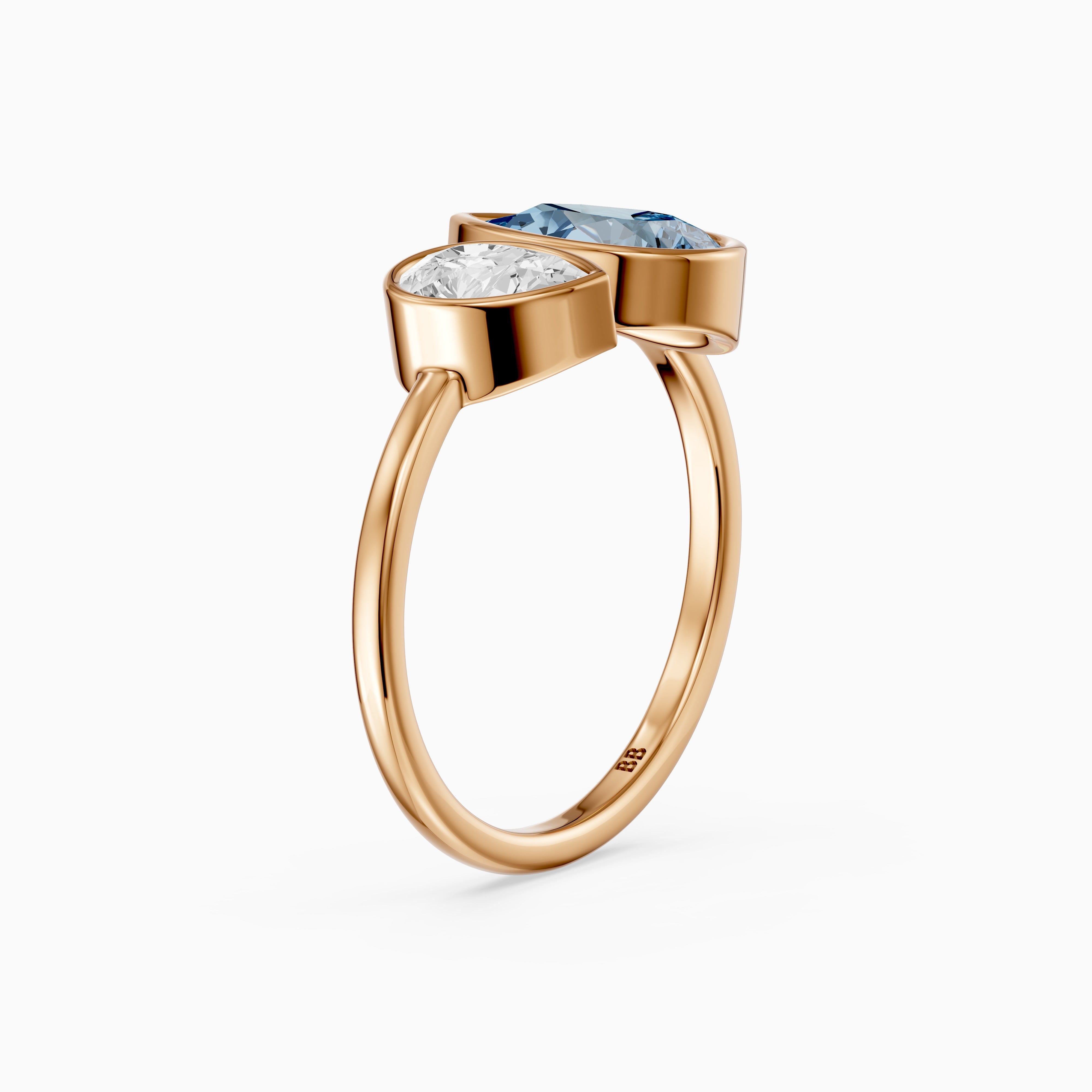 Nicolina Blue and White Pear Cut Colored Lab Grown Diamond Toi et Moi Bezel Ring