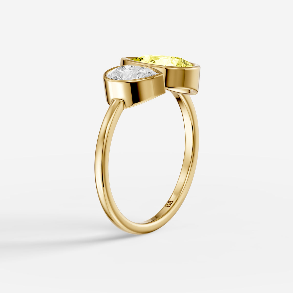 Fiora Yellow and White Pear Cut Colored Lab Grown Diamond Toi et Moi Bezel Ring