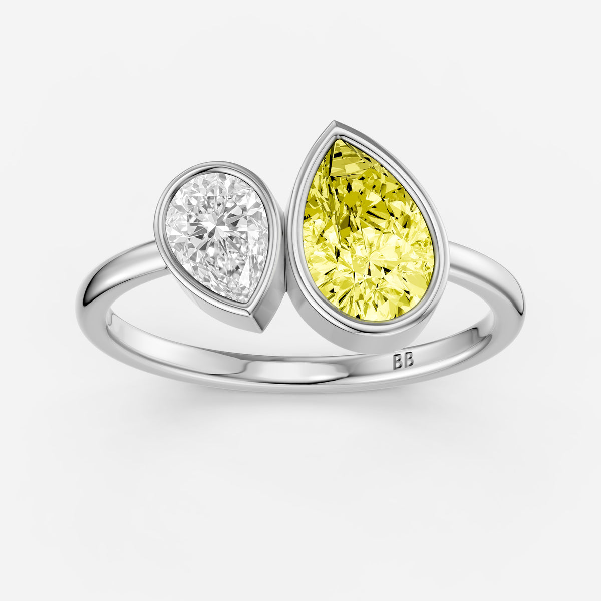 Fiora Yellow and White Pear Cut Colored Lab Grown Diamond Toi et Moi Bezel Ring