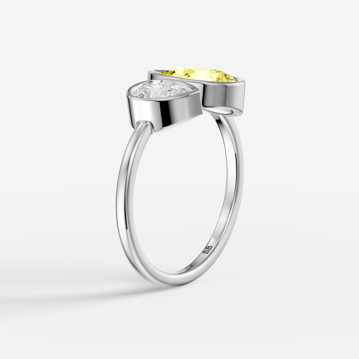 Fiora Yellow and White Pear Cut Colored Lab Grown Diamond Toi et Moi Bezel Ring