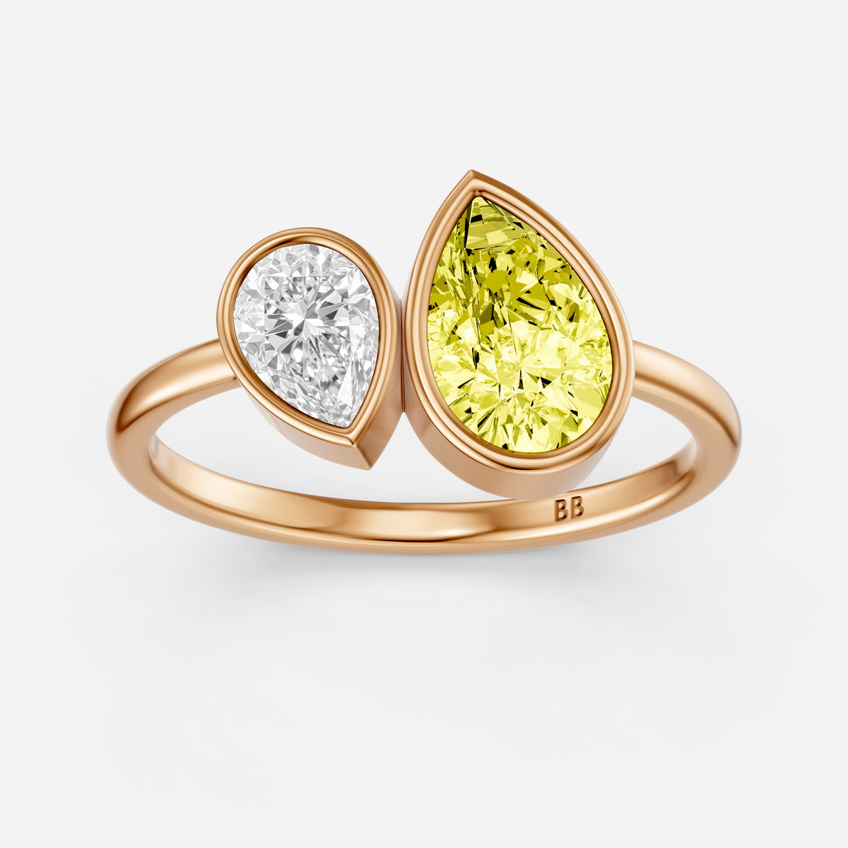 Fiora Yellow and White Pear Cut Colored Lab Grown Diamond Toi et Moi Bezel Ring