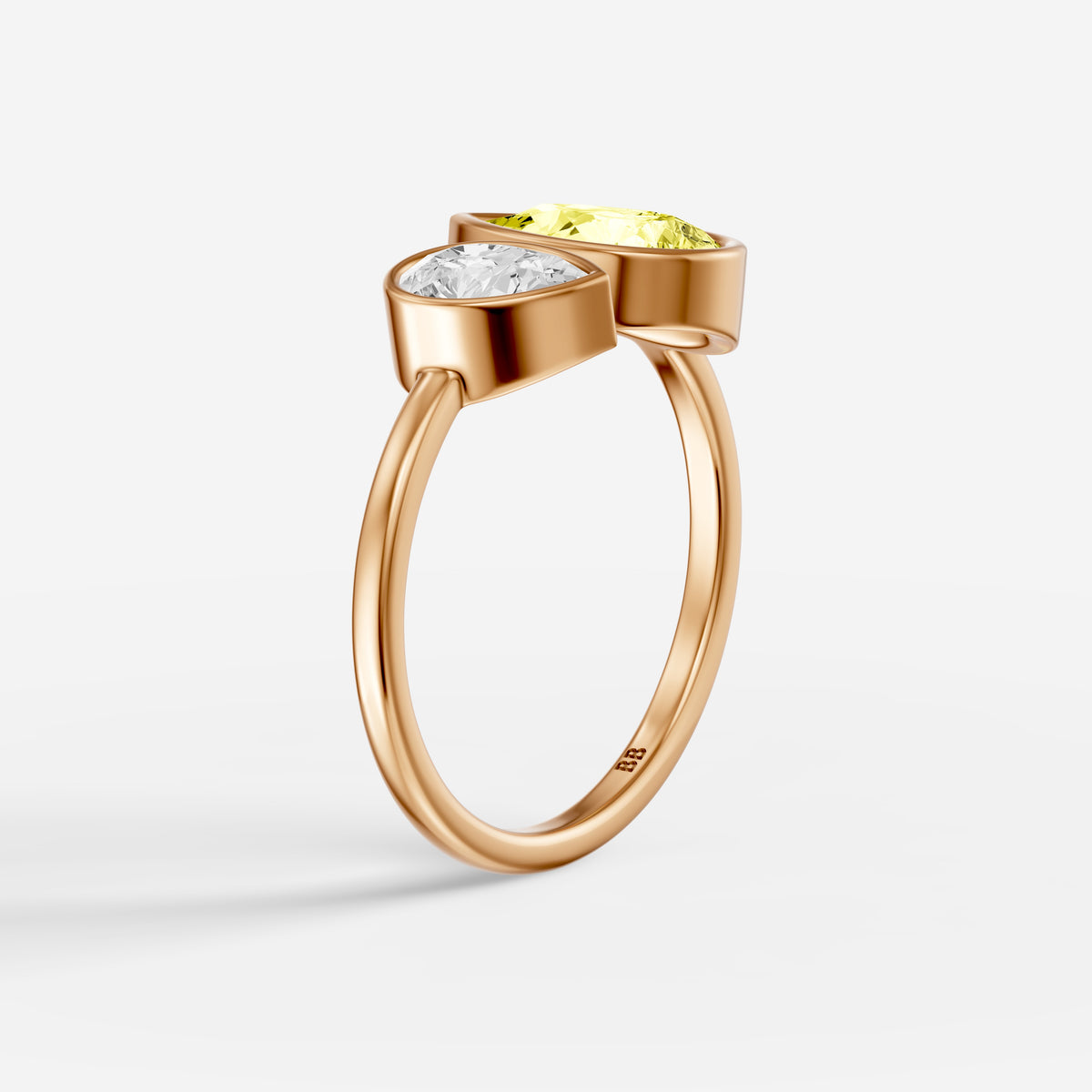 Fiora Yellow and White Pear Cut Colored Lab Grown Diamond Toi et Moi Bezel Ring