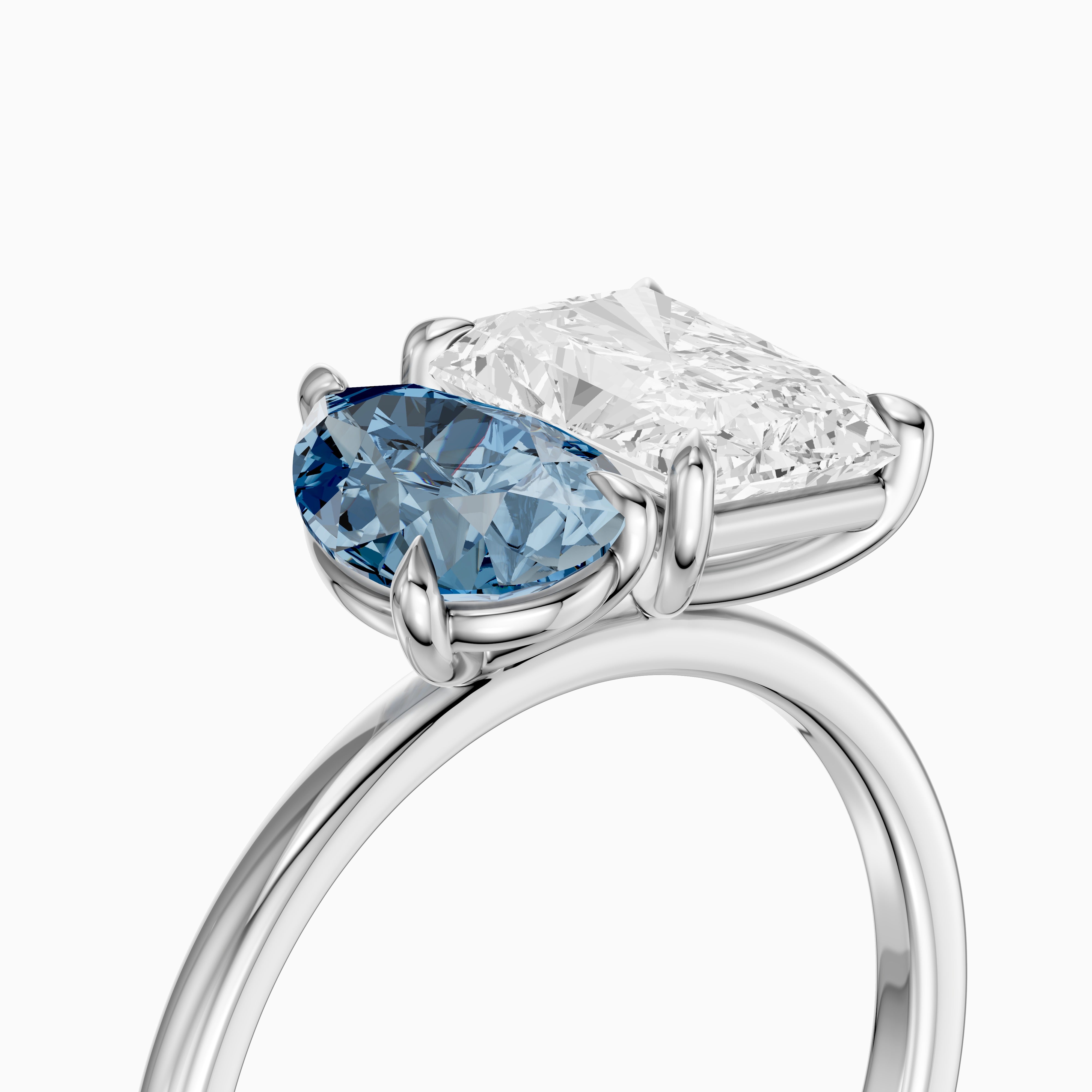 Eulalia Blue Pear and Radiant Cut Colored Lab Grown Diamond Toi et Moi Ring