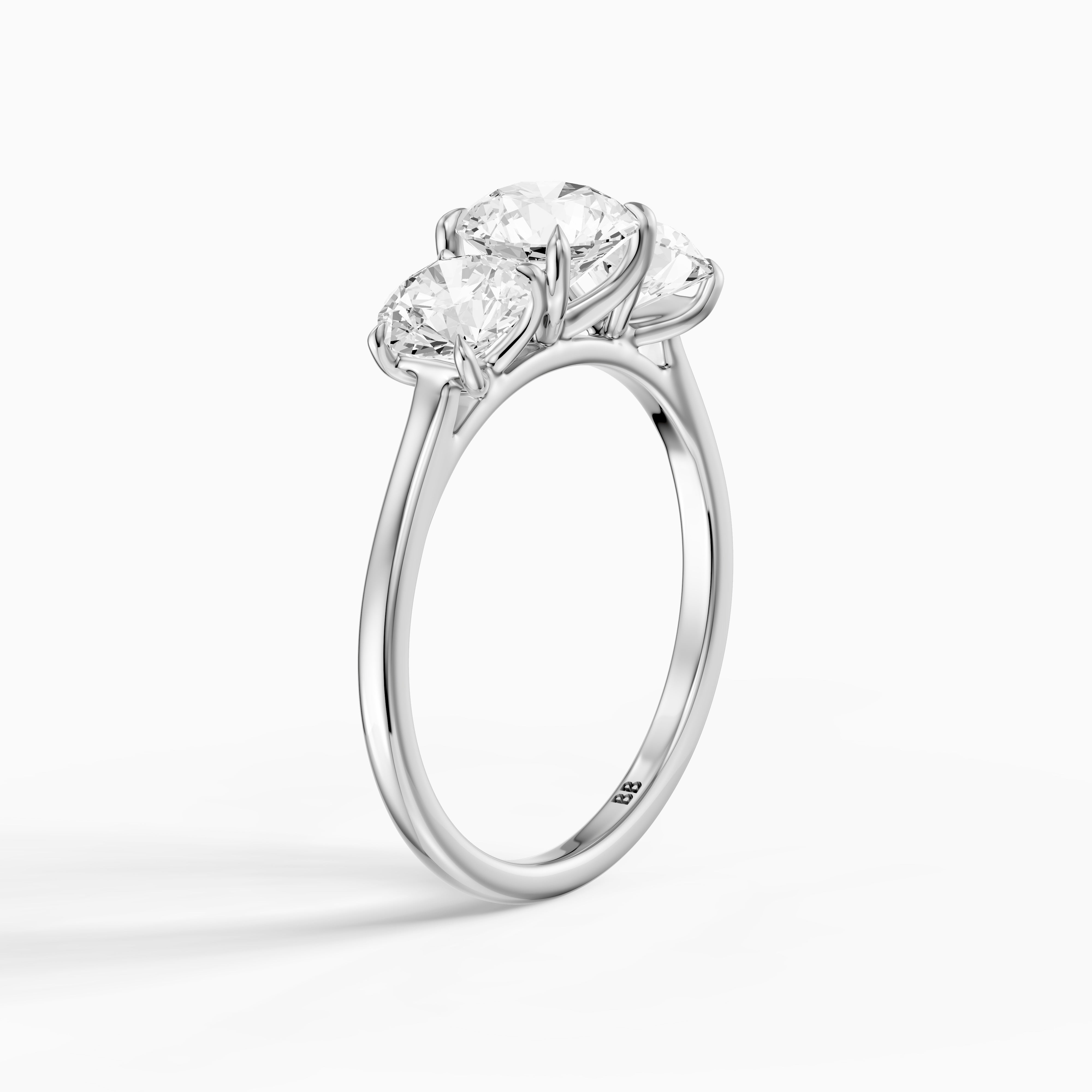 Kassie Round Cut Three Stone Cathedral Style Lab Grown Diamond Ring