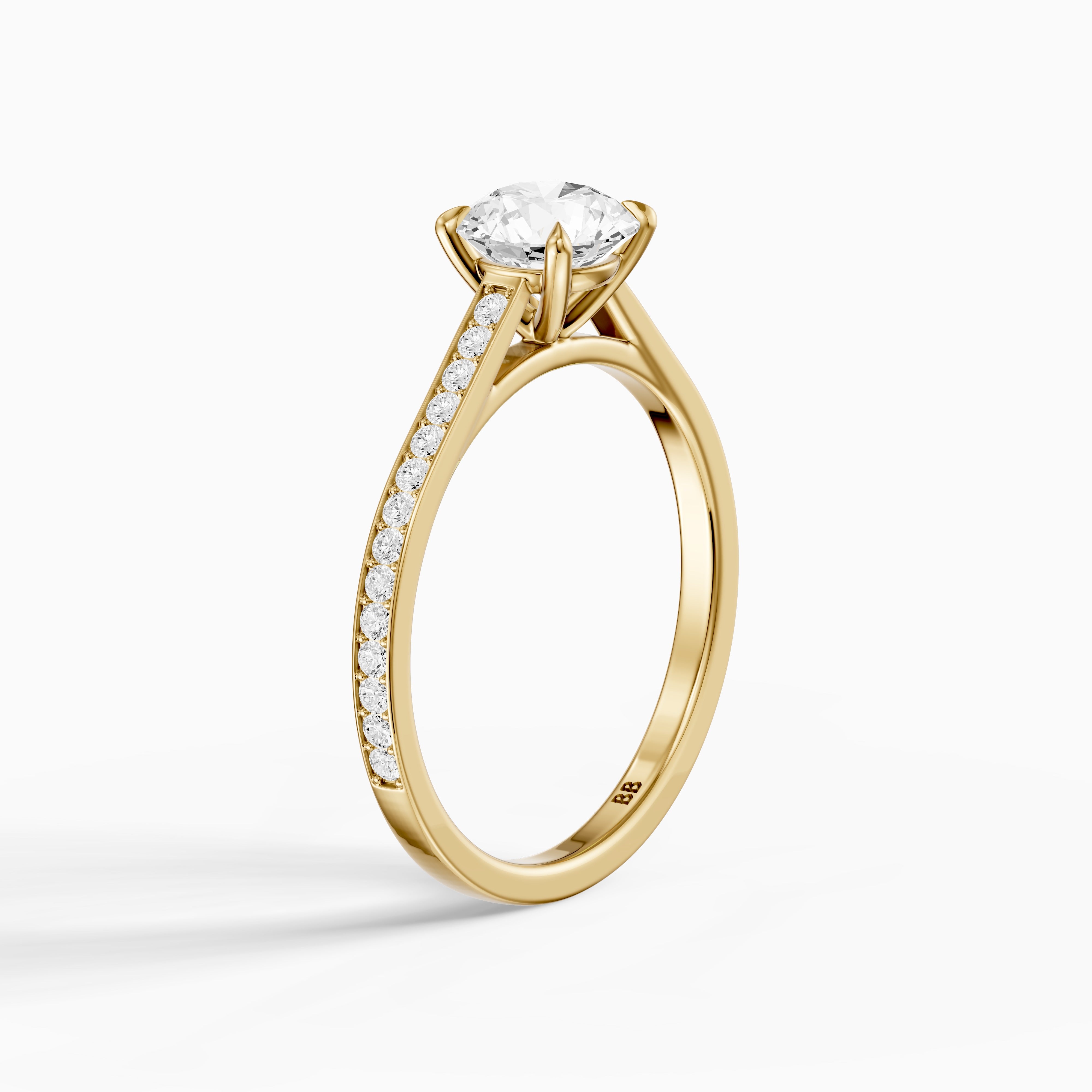 Callie 4 Prong Round Cut Side Stone Channel Set Moissanite Diamond Ring