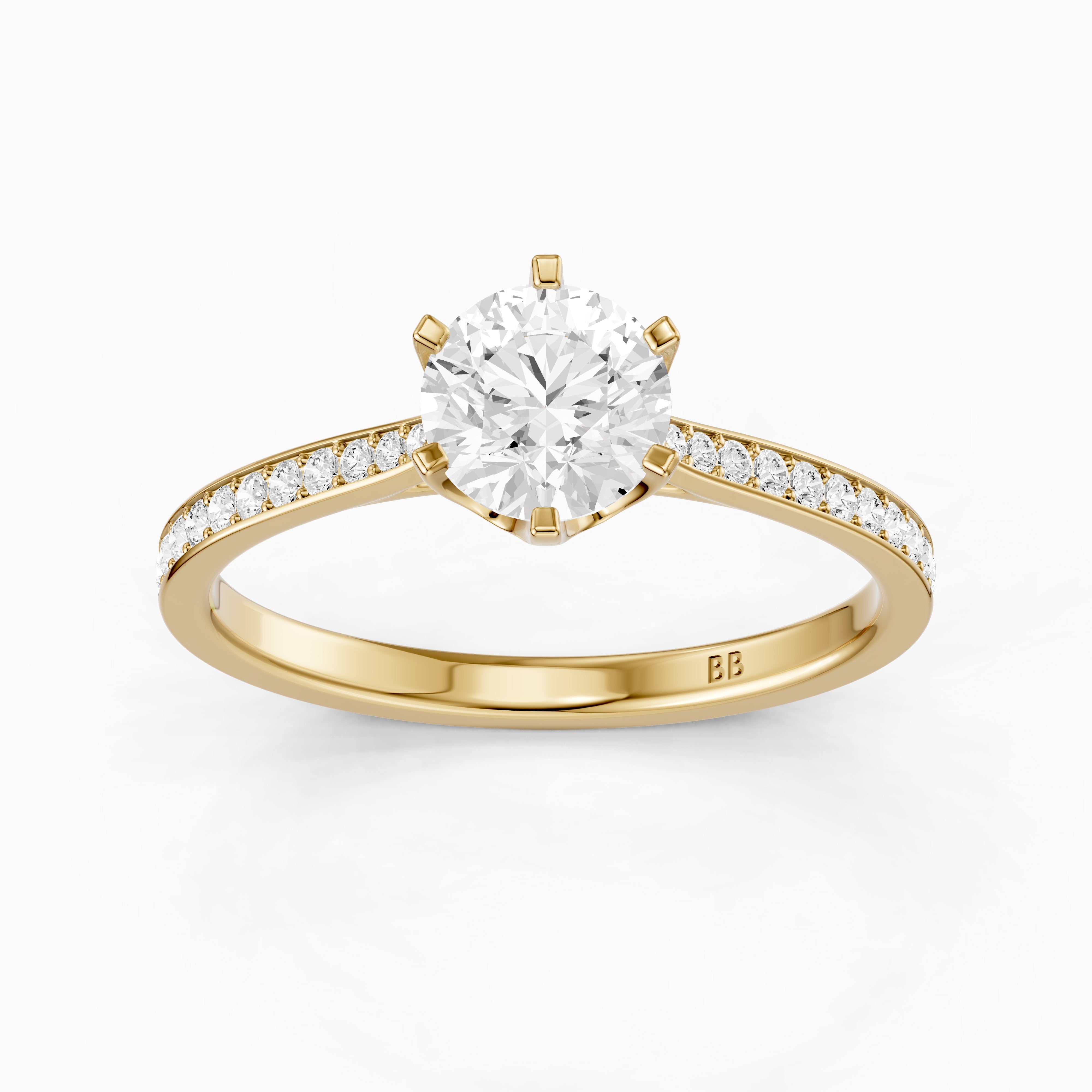Desire 6 Prong Round Cut Side Stone Channel Set Moissanite Diamond Ring