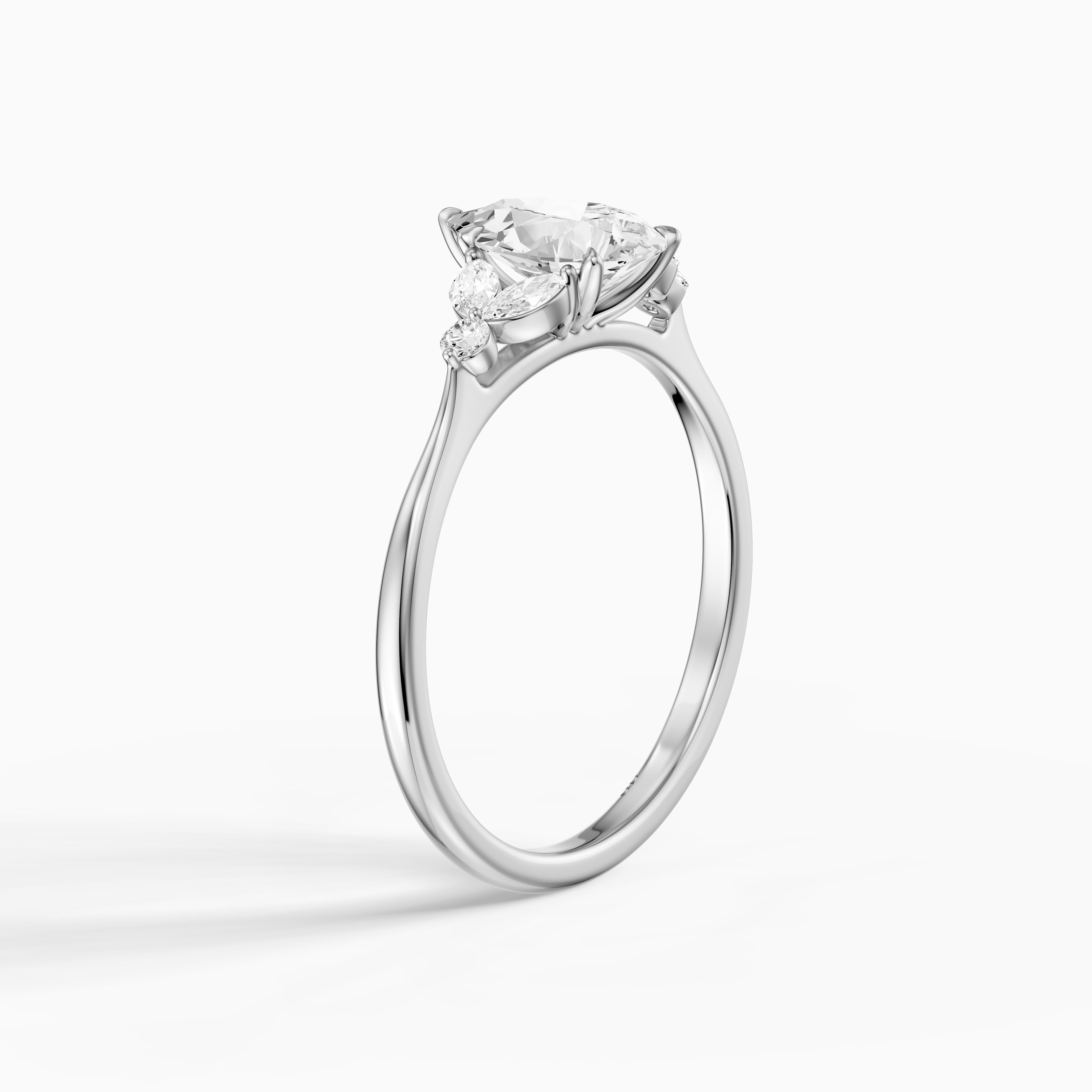 Liora Pear Cut Moissanite Diamond Ring with Marquise Side Stone Cluster