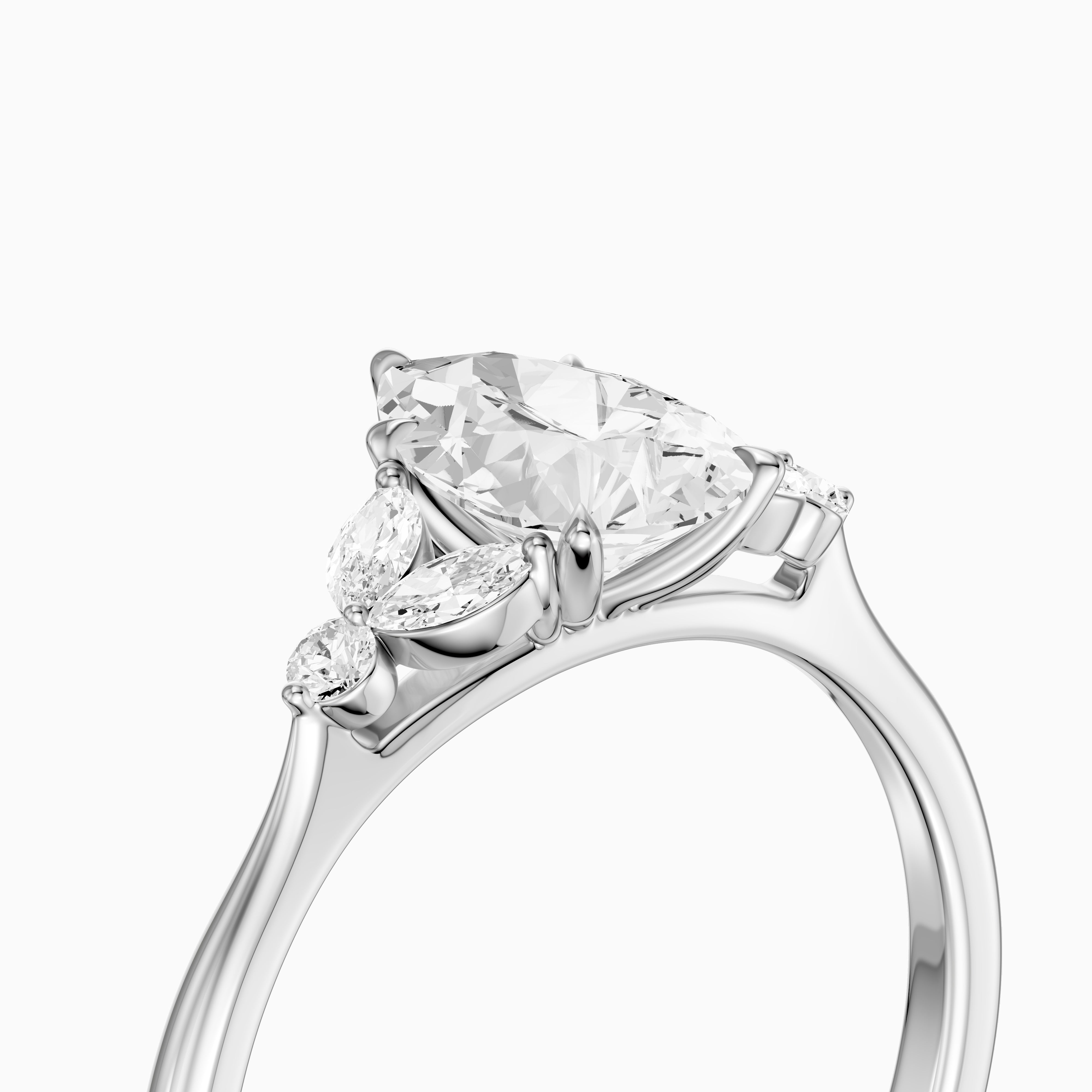 Liora Pear Cut Moissanite Diamond Ring with Marquise Side Stone Cluster