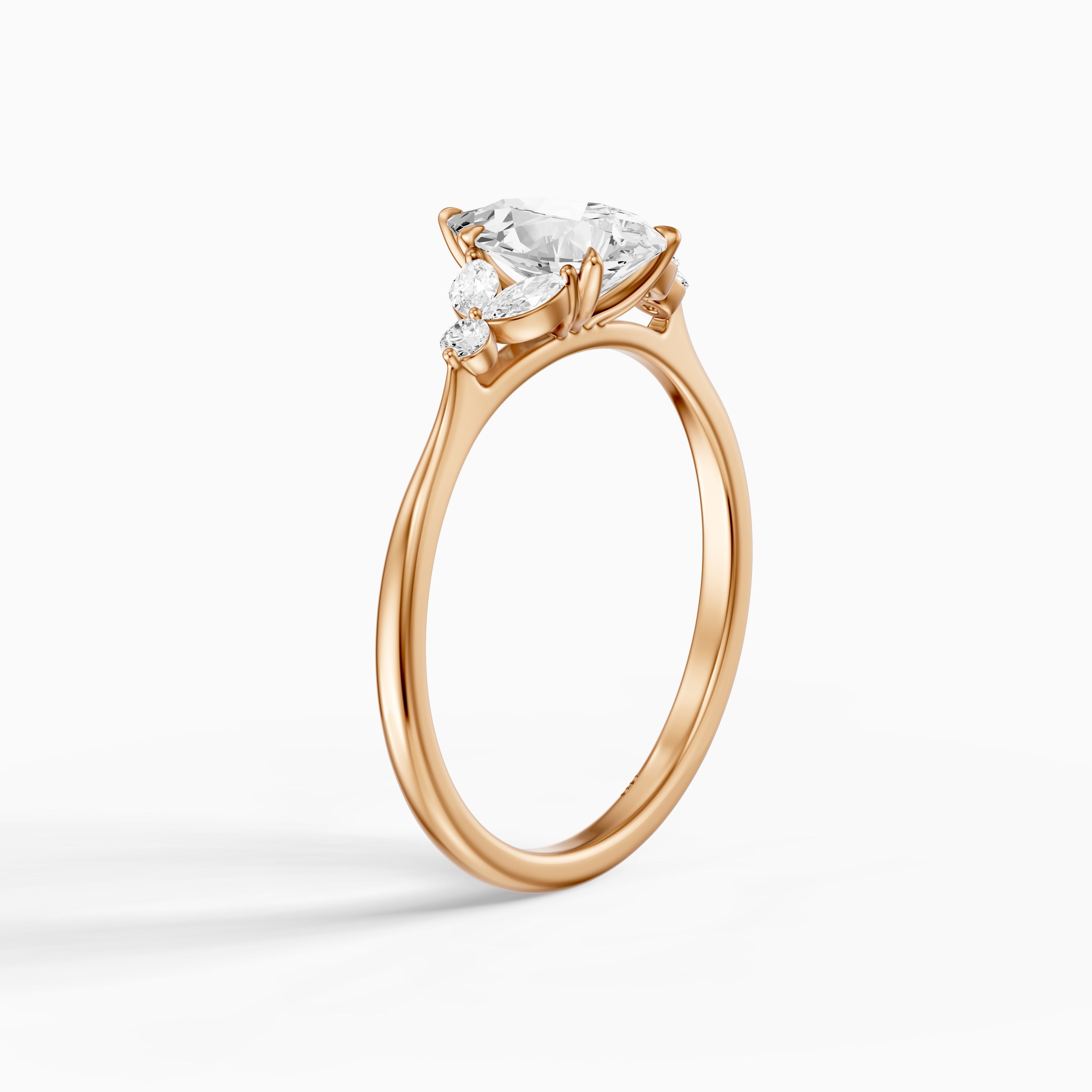 Liora Pear Cut Moissanite Diamond Ring with Marquise Side Stone Cluster