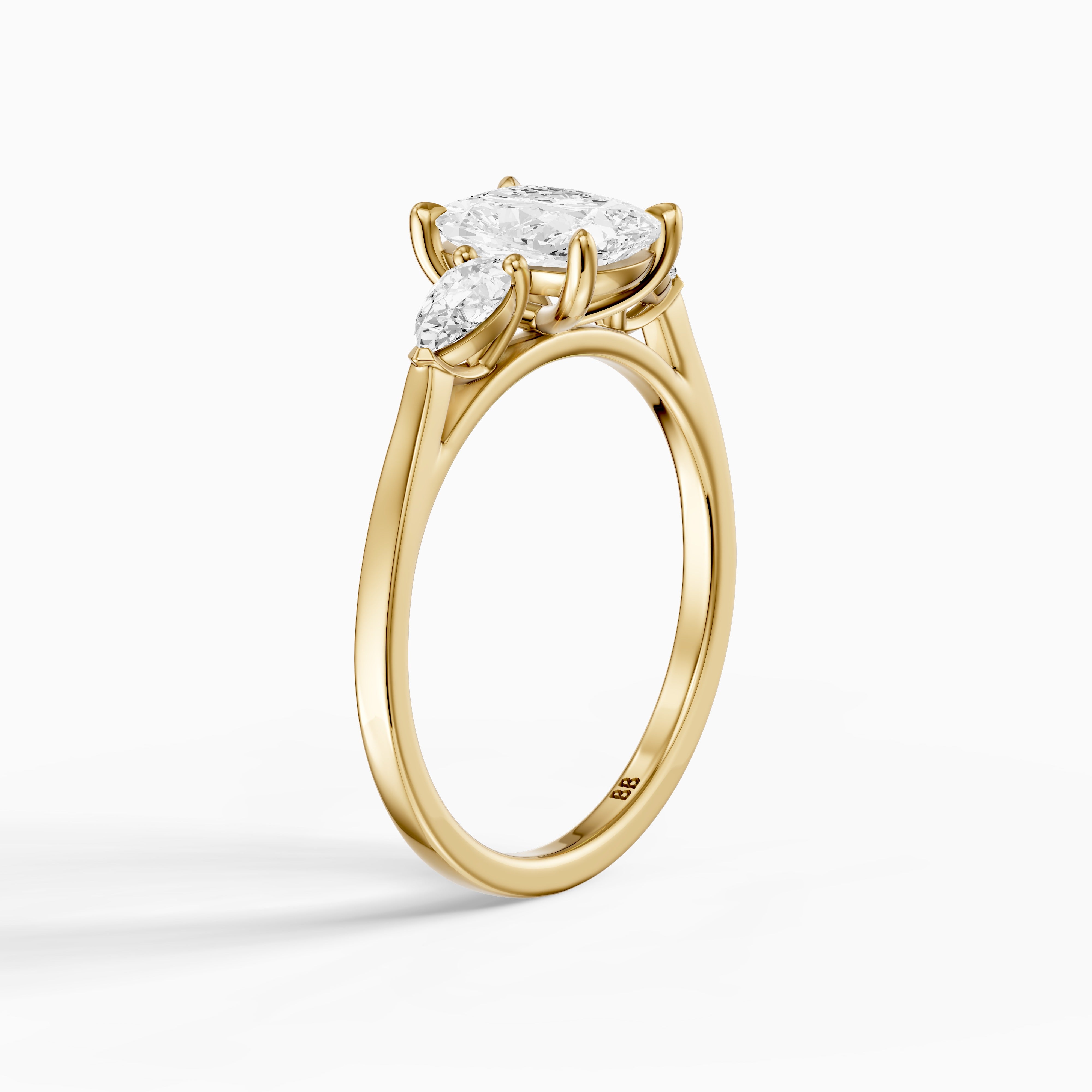Nalani Three Stone Elongated Cushion Cut Lab Grown Diamond Ring with Pear Side Stones