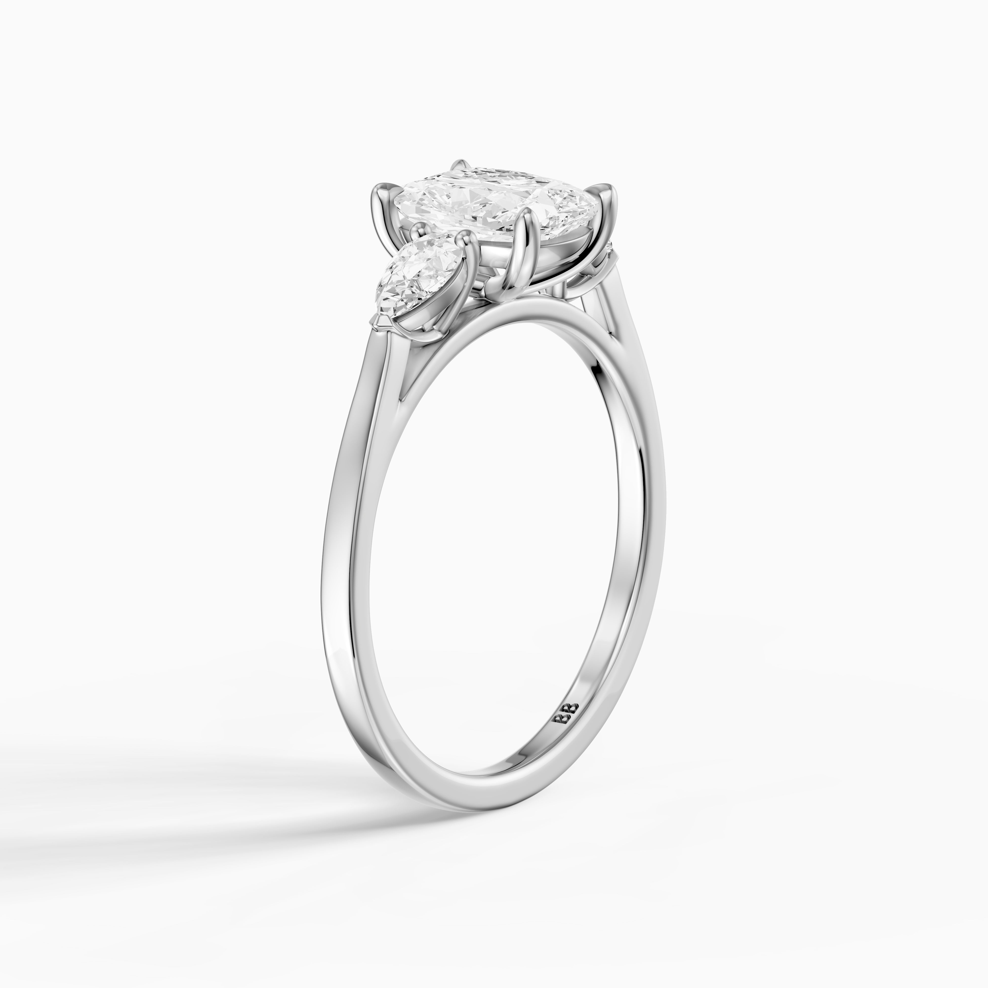 Nalani Three Stone Elongated Cushion Cut Moissanite Diamond Ring with Pear Side Stones