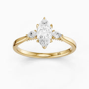 Hazel Marquise Three Stone Moissanite Ring in Tulip Cathedral Setting