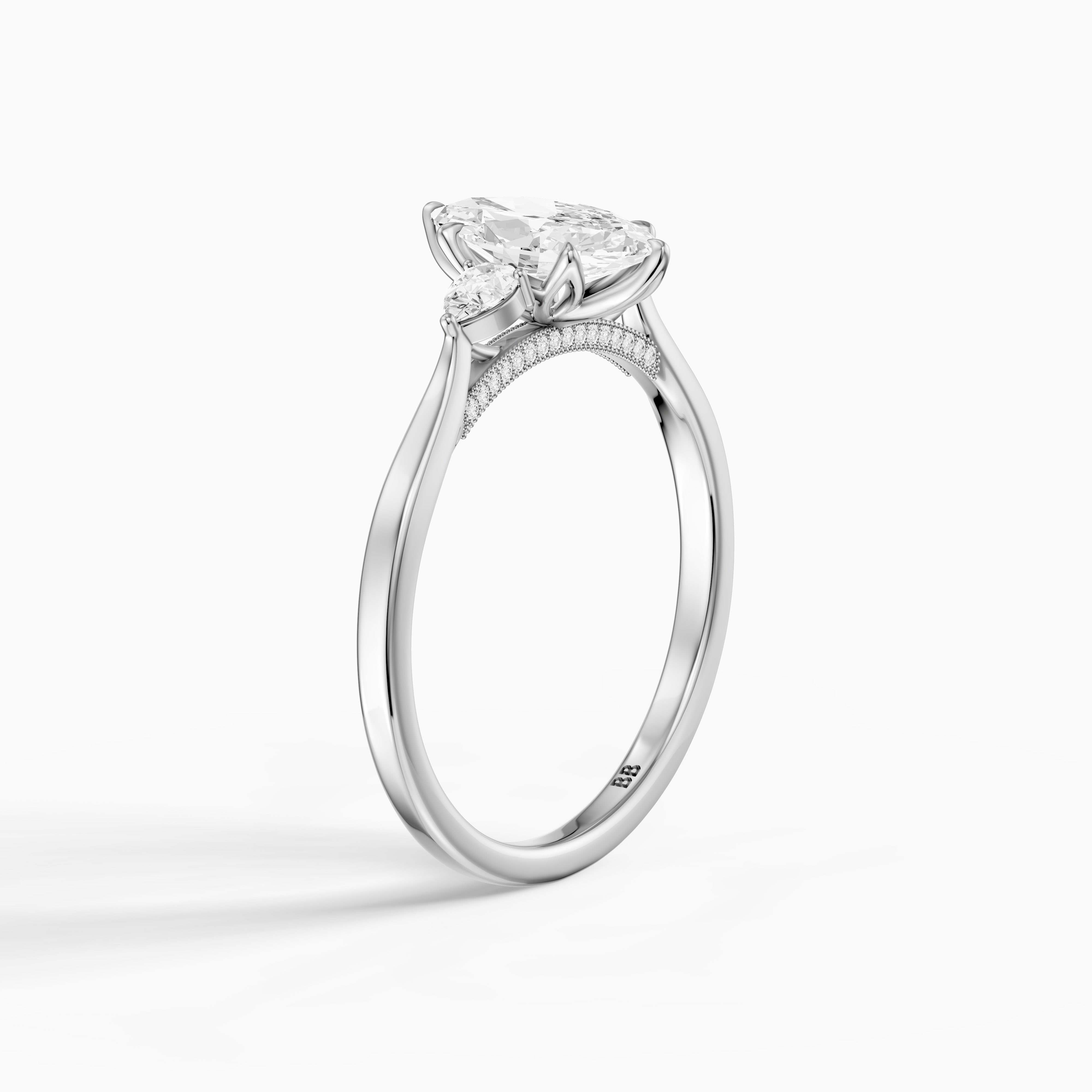 Hazel Marquise Three Stone Moissanite Ring in Tulip Cathedral Setting
