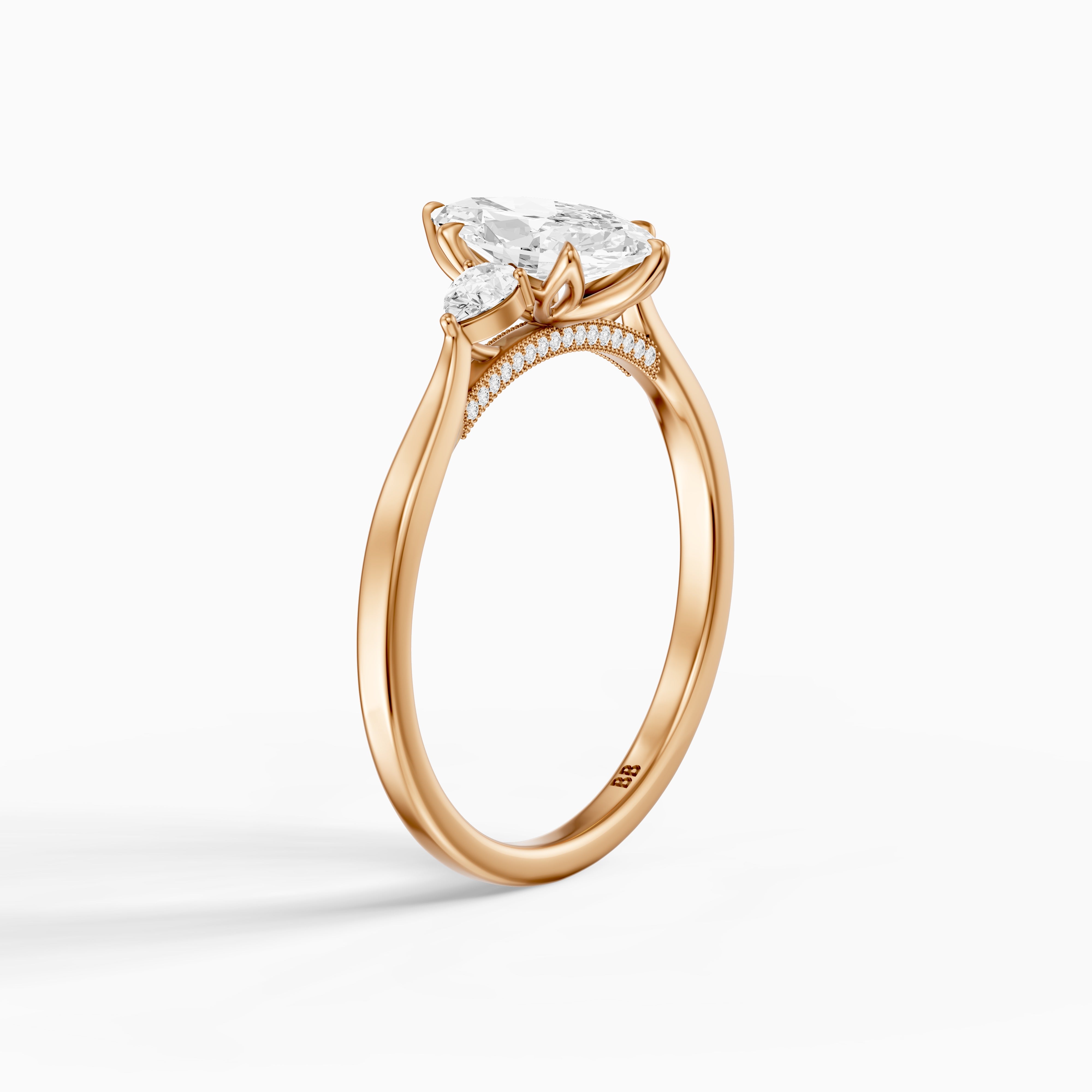 Hazel Marquise Three Stone Moissanite Ring in Tulip Cathedral Setting
