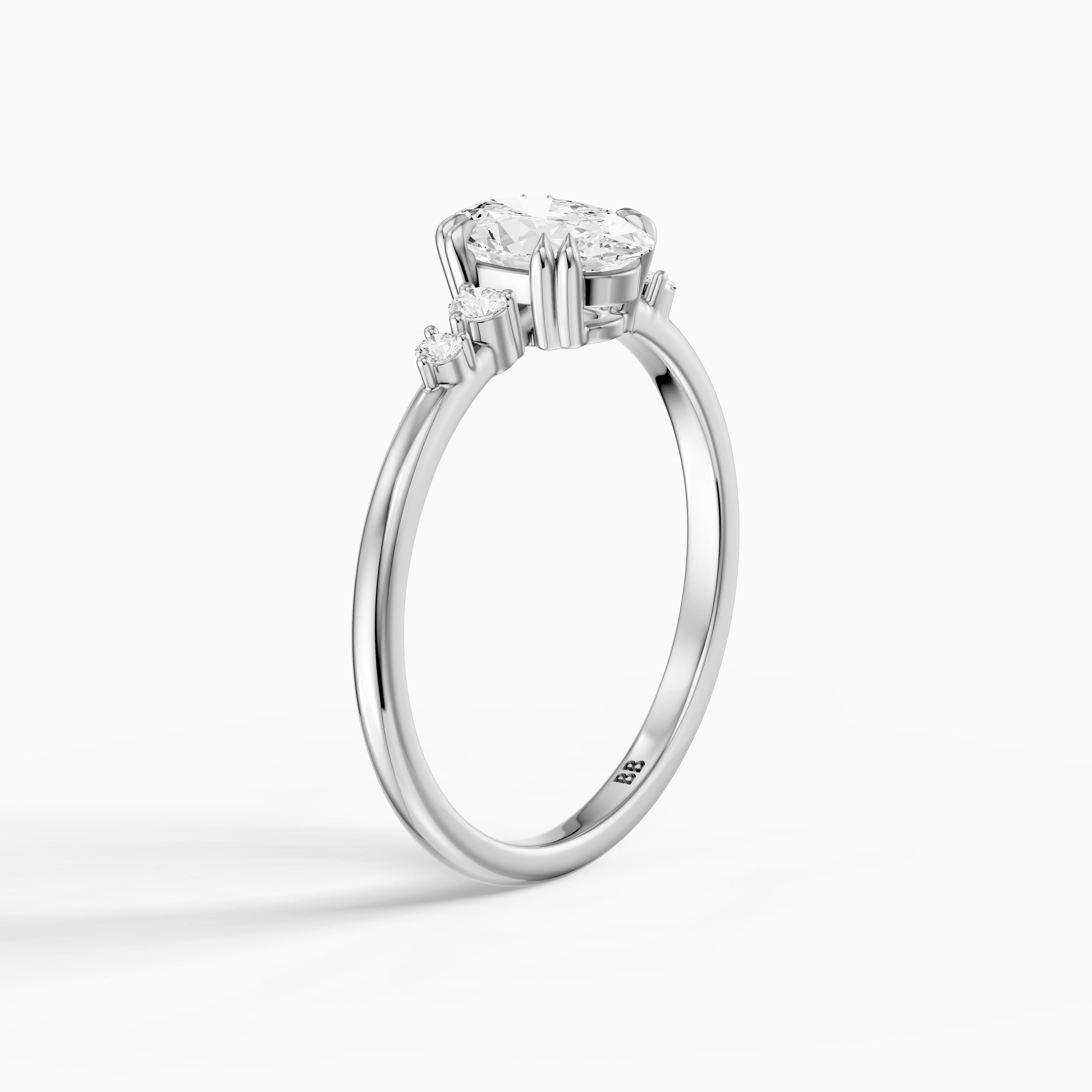 Lucille Oval Double Claw Prong Moissanite Diamond Ring with Side Stones