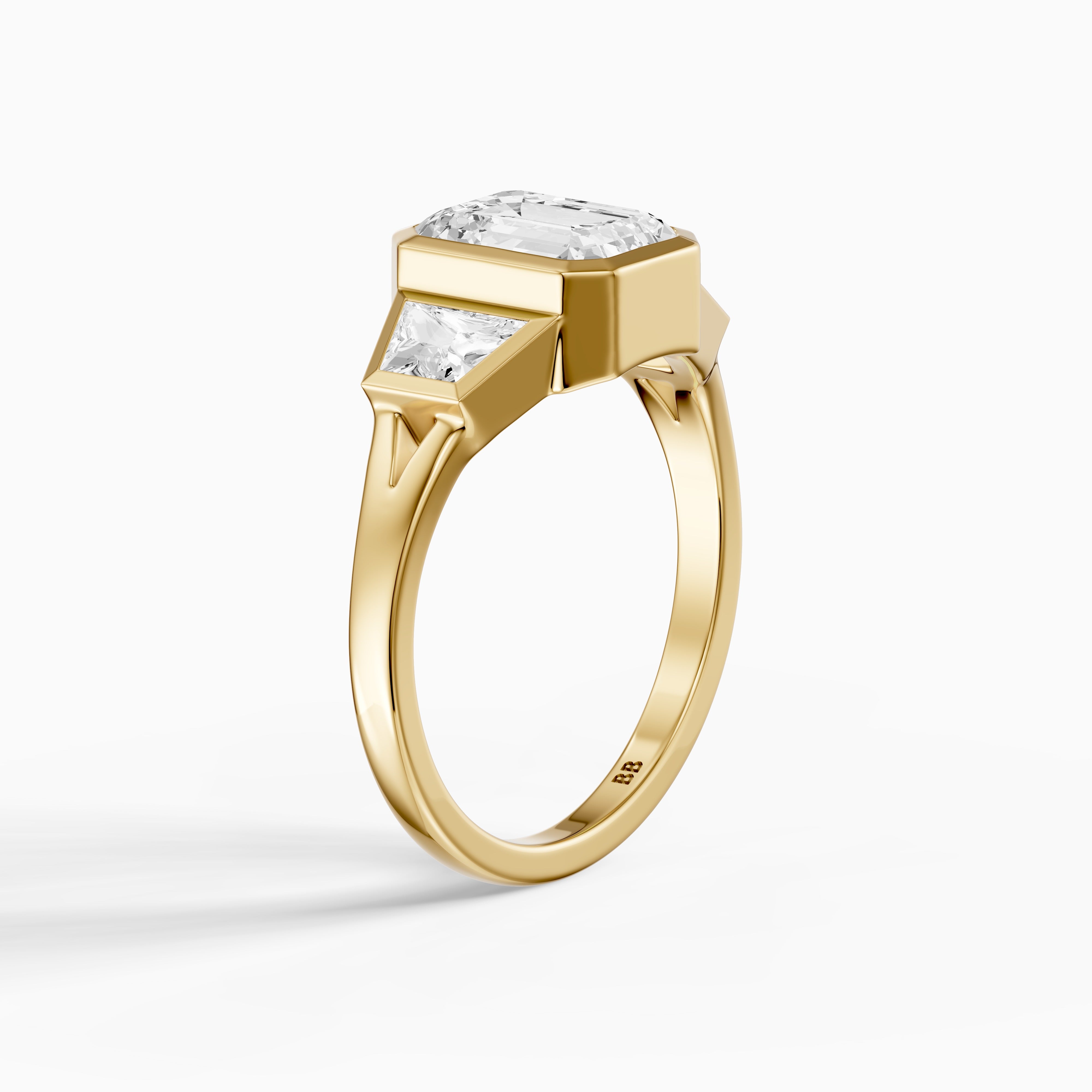 Stevie Emerald Cut Moissanite Diamond Bezel Ring with Trapezoid Side Stones