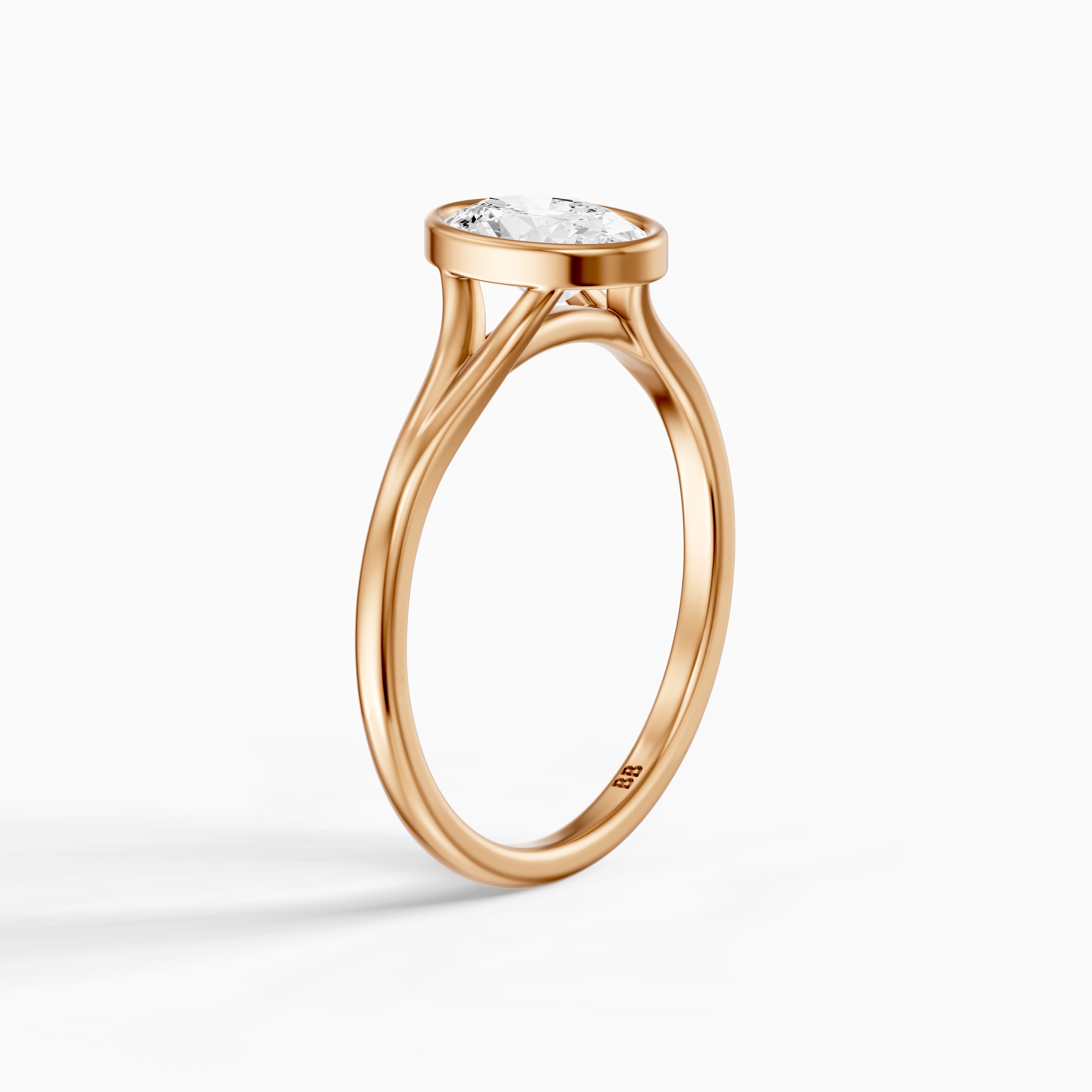 Ember Oval Cut Lab Grown Diamond Ring in Bezel Set Split Shank Style