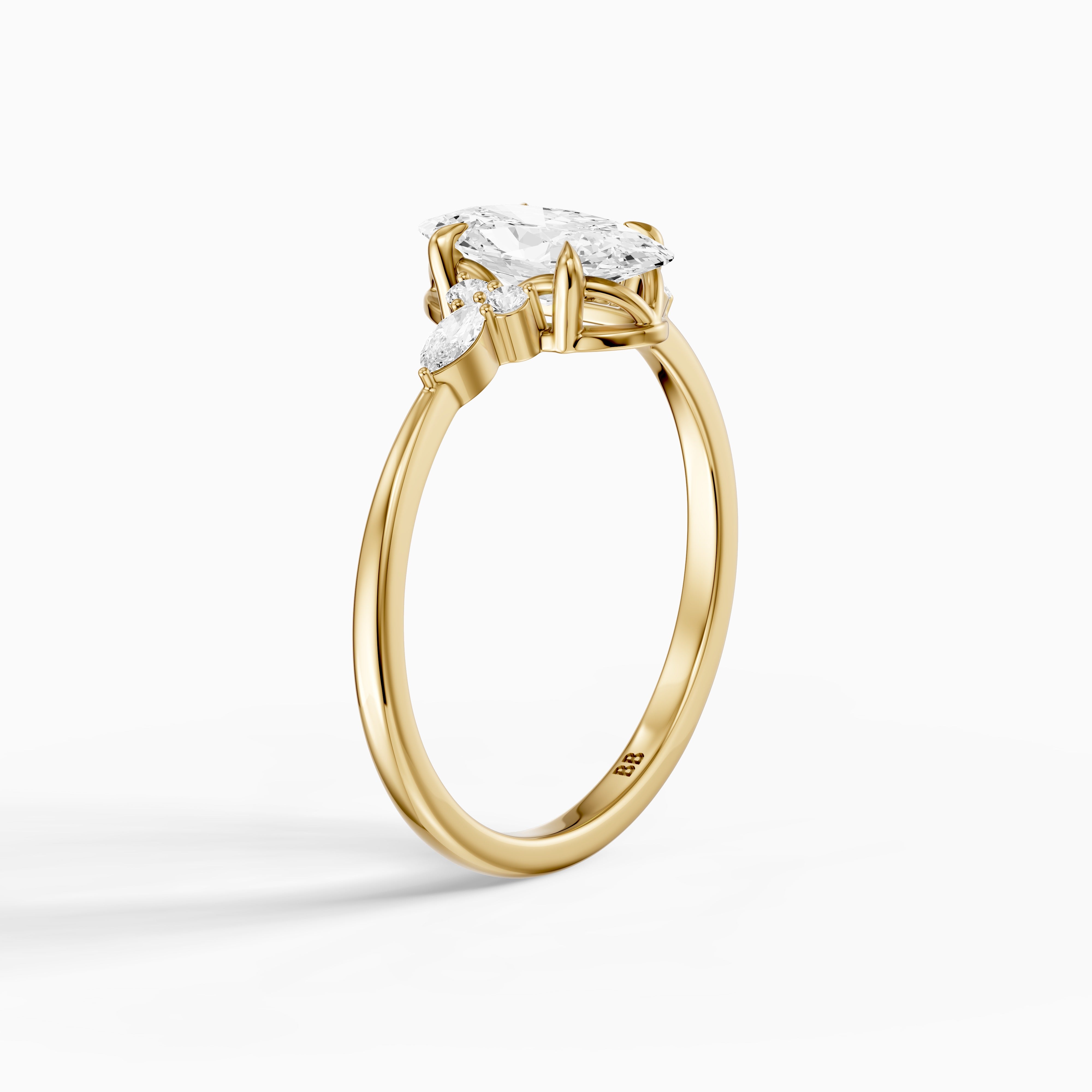 Estela Moval Moissanite Diamond Ring with Pear and Round Side Stones