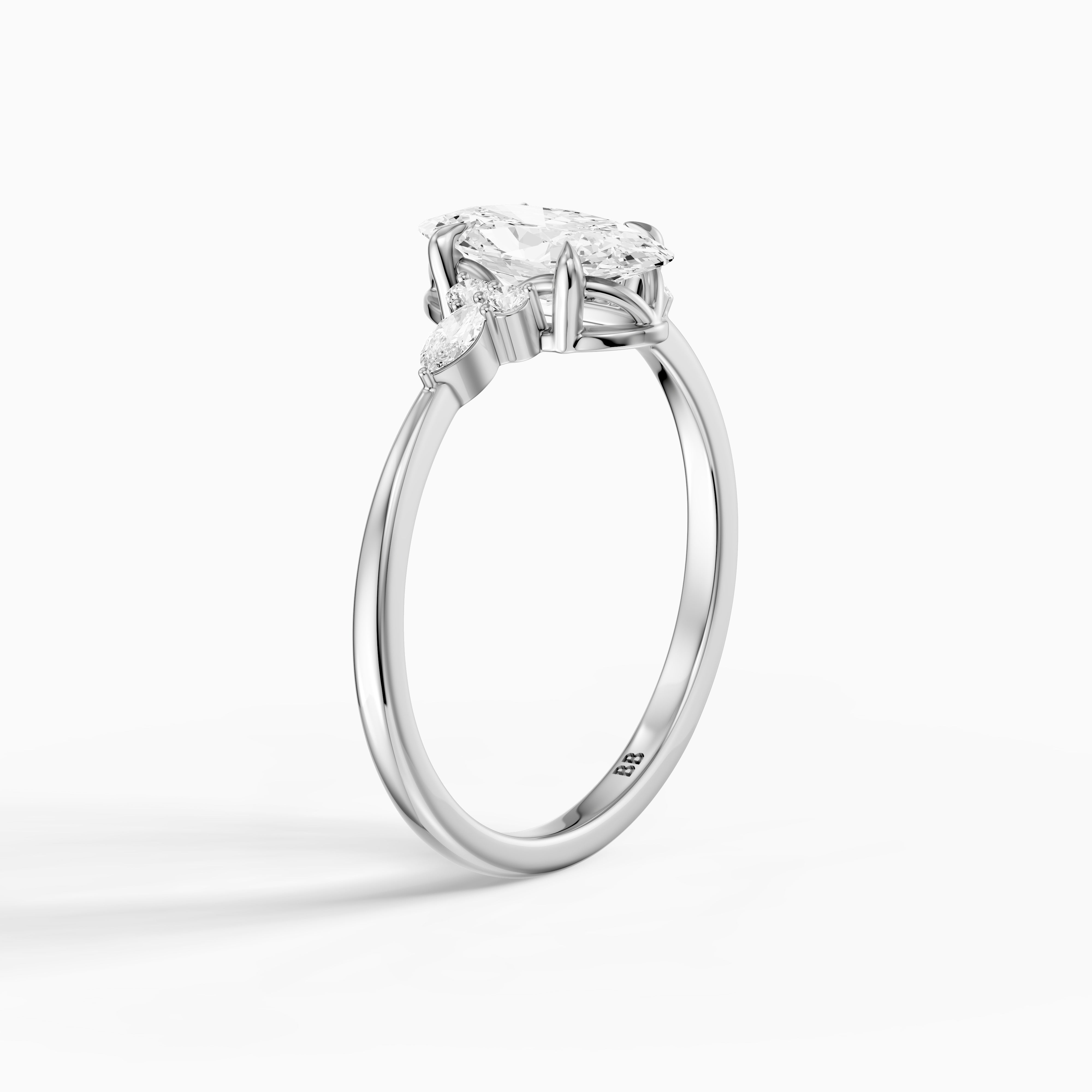 Estela Moval Moissanite Diamond Ring with Pear and Round Side Stones