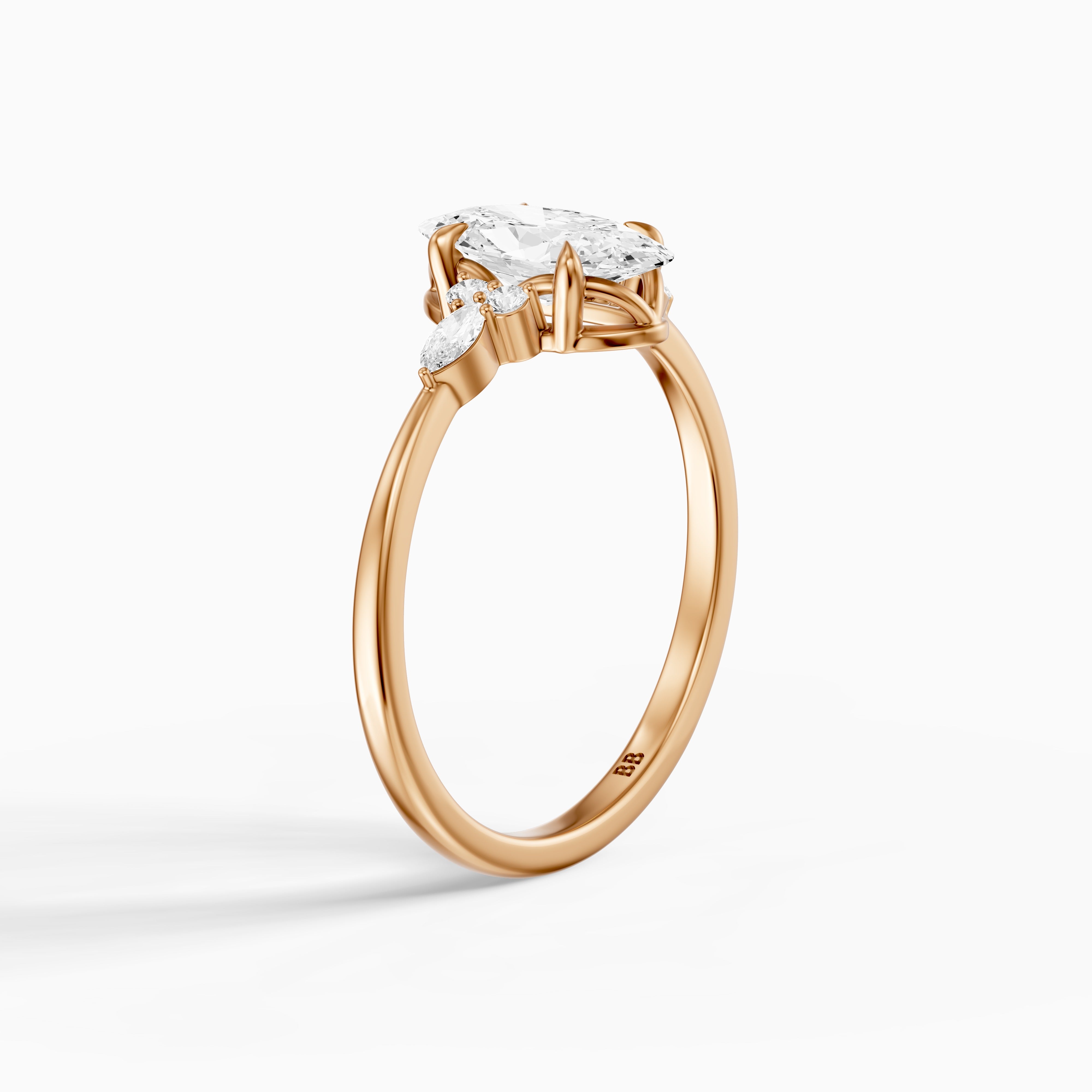 Estela Moval Moissanite Diamond Ring with Pear and Round Side Stones