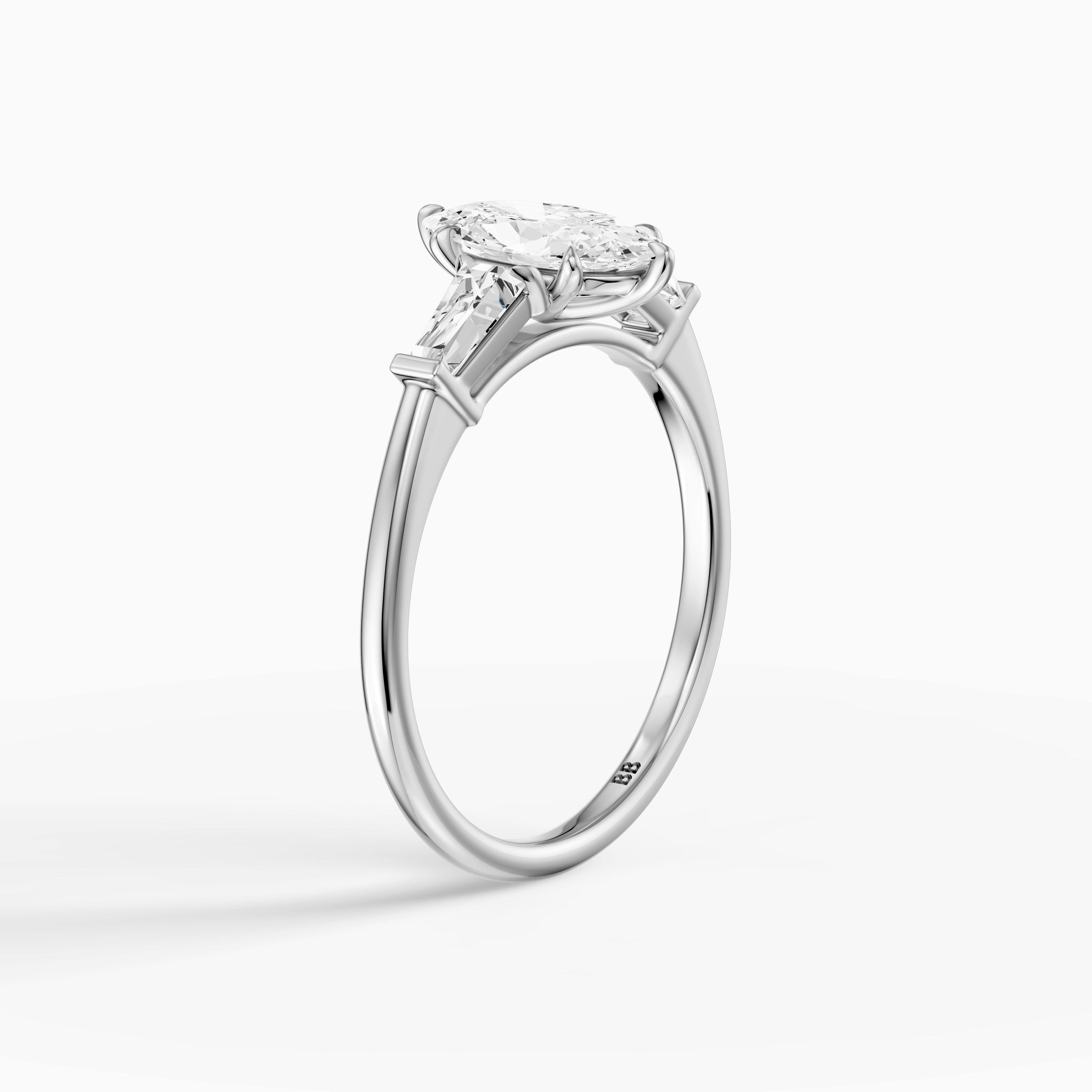 Letizia Three Stone Moval Moissanite Diamond Ring with Tapered Baguettes