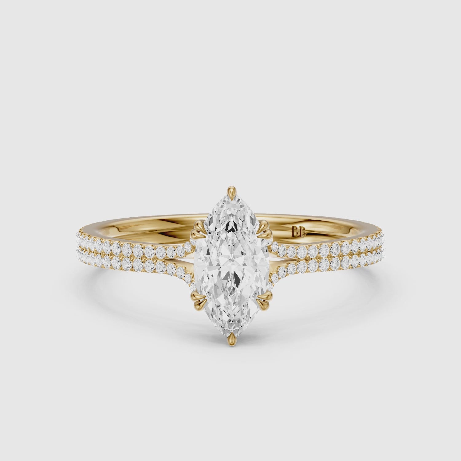 Load video: Evie Marquise Lab Grown Diamond Ring with Double Claw Prong and Pave Band