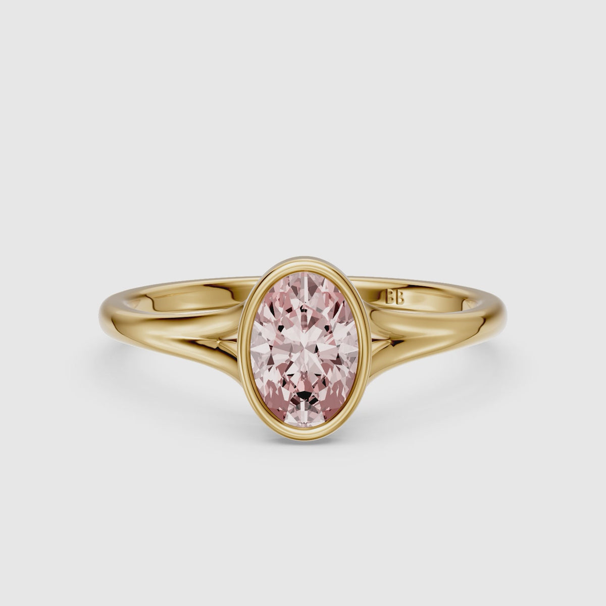 Load video: Elliot Oval Cut Pink Lab Grown Diamond Ring in Bezel Set Split Shank Style