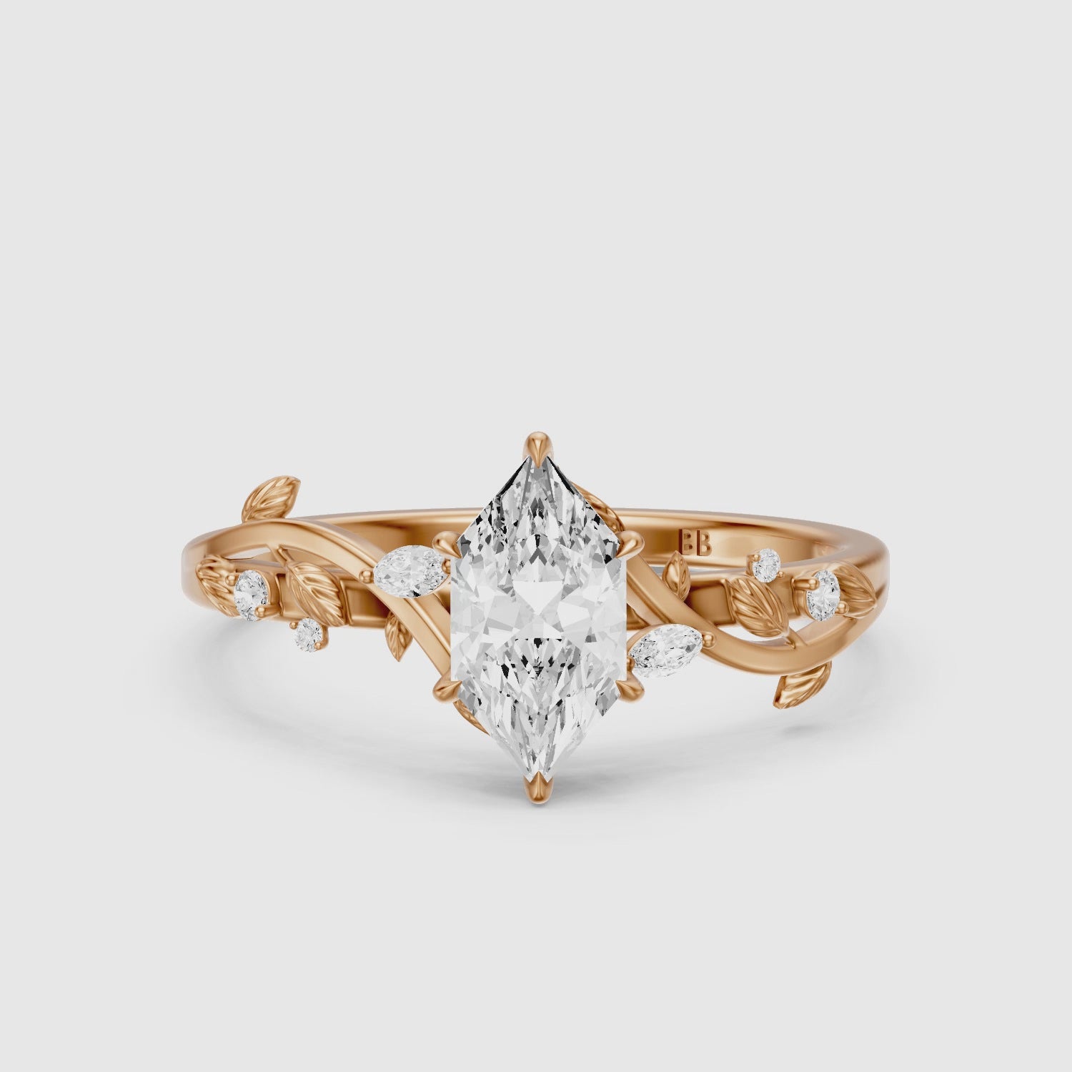 Load video: Eva Dutch Marquise Moissanite Diamond Ring with Leaf Vine Band