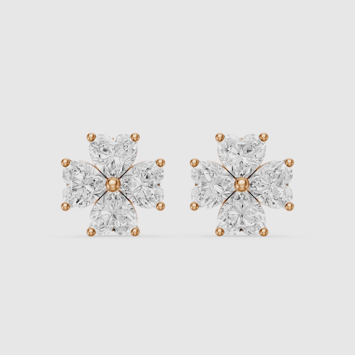 Load video: Eponine Heart Cut Lab Grown Diamond Four Petal Flower Stud Earrings