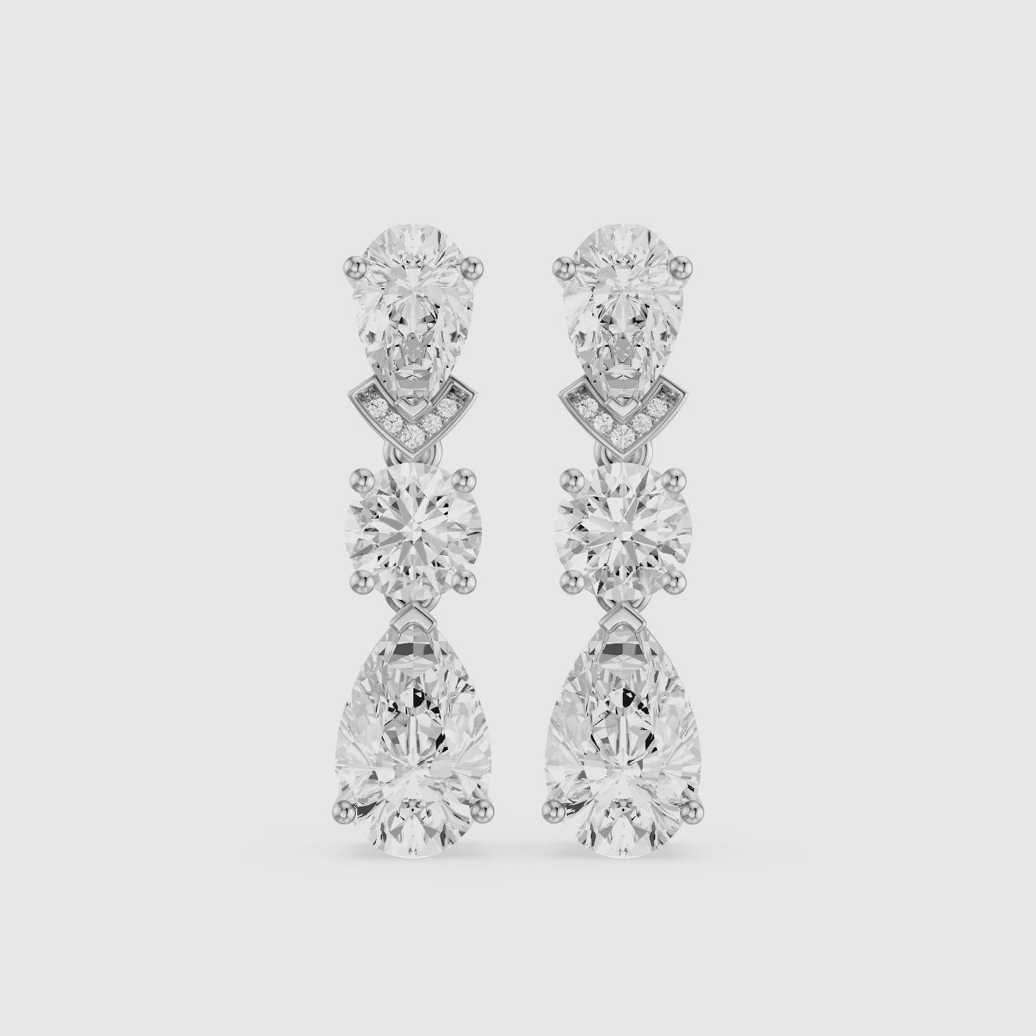 Load video: Jillian Pear and Round Lab Grown Diamond Drop Earrings