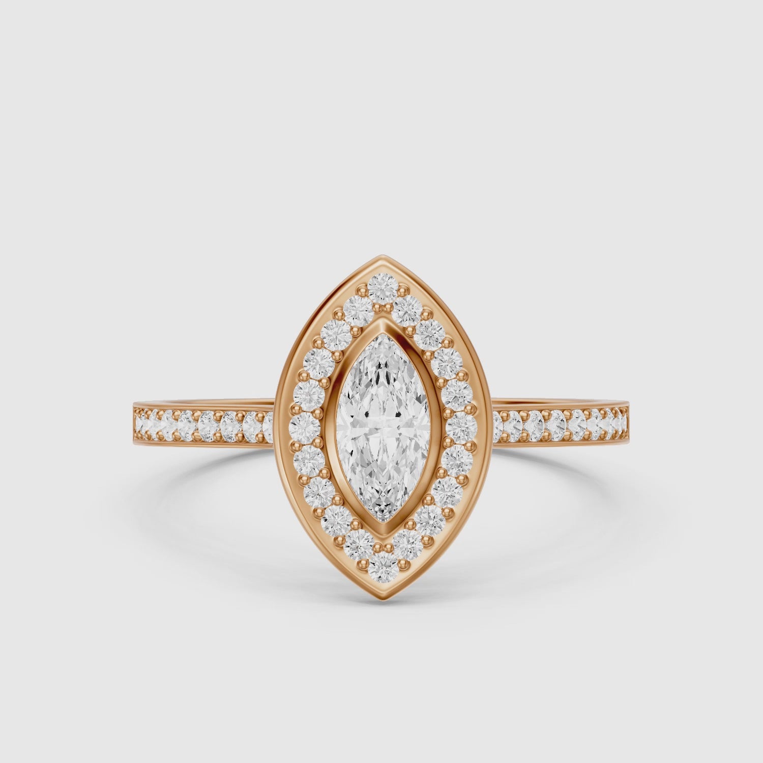 Load video: Celeste Marquise Moissanite Diamond Ring with Bezel Inspired Halo Setting