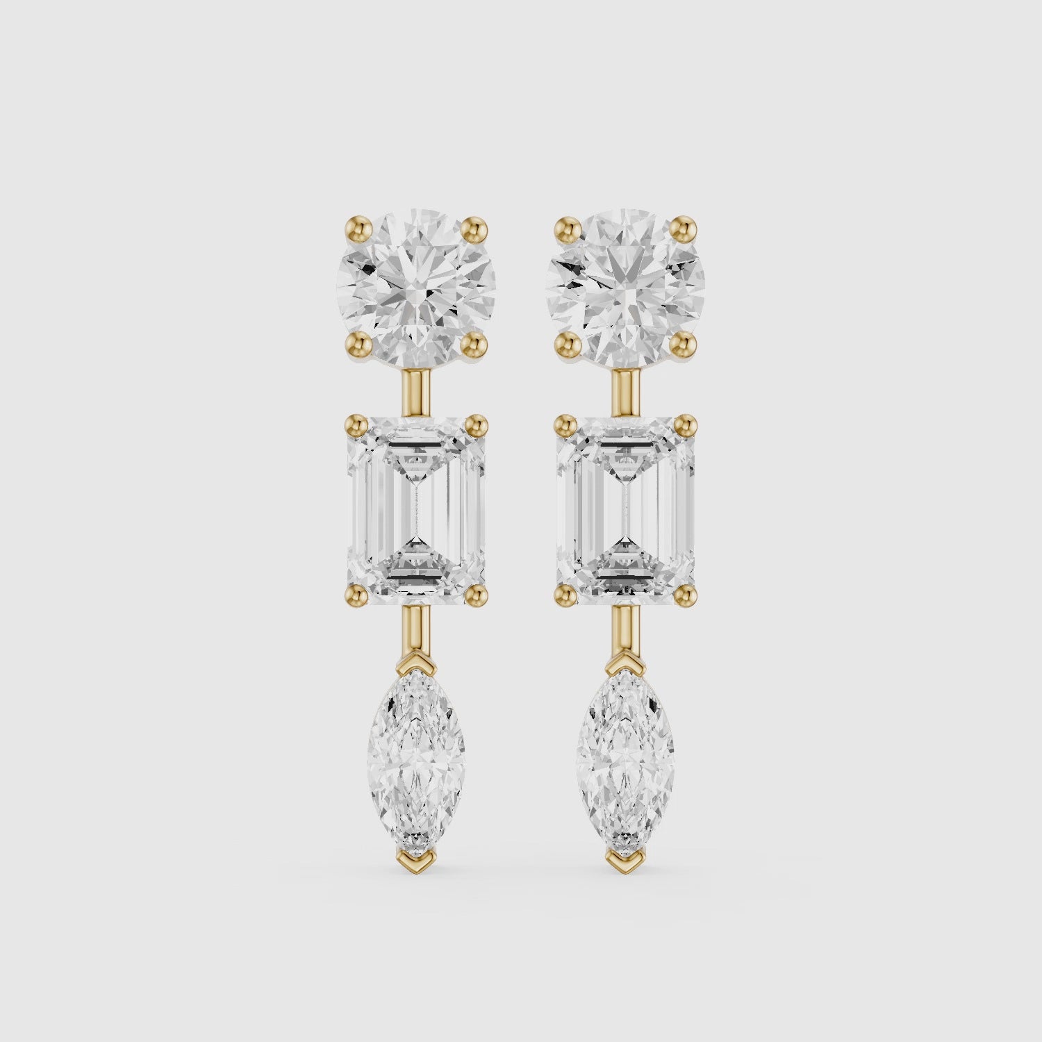 Load video: Elysia Round, Emerald, and Marquise Lab Grown Diamond Dangle Earrings