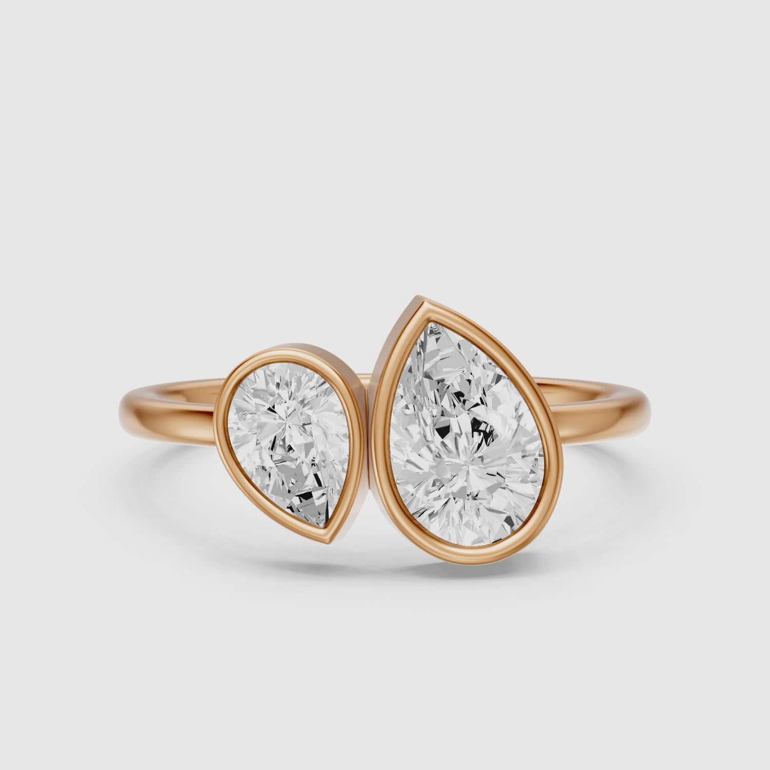 Load video: Nora Toi et Moi Pear Cut Lab Grown Diamond Ring in Bezel Setting