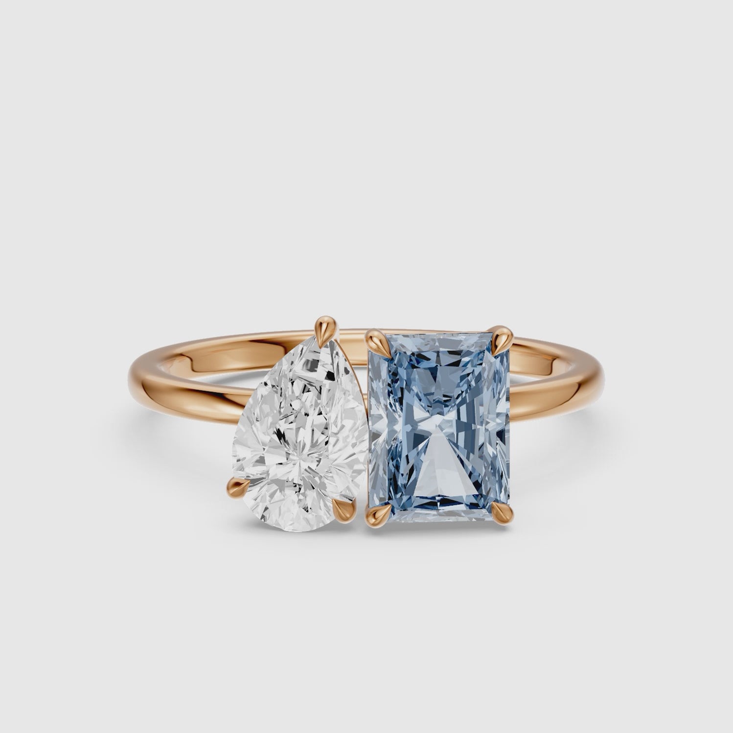 Load video: Milica Blue Radiant and Pear Cut Colored Lab Grown Diamond Toi et Moi Ring