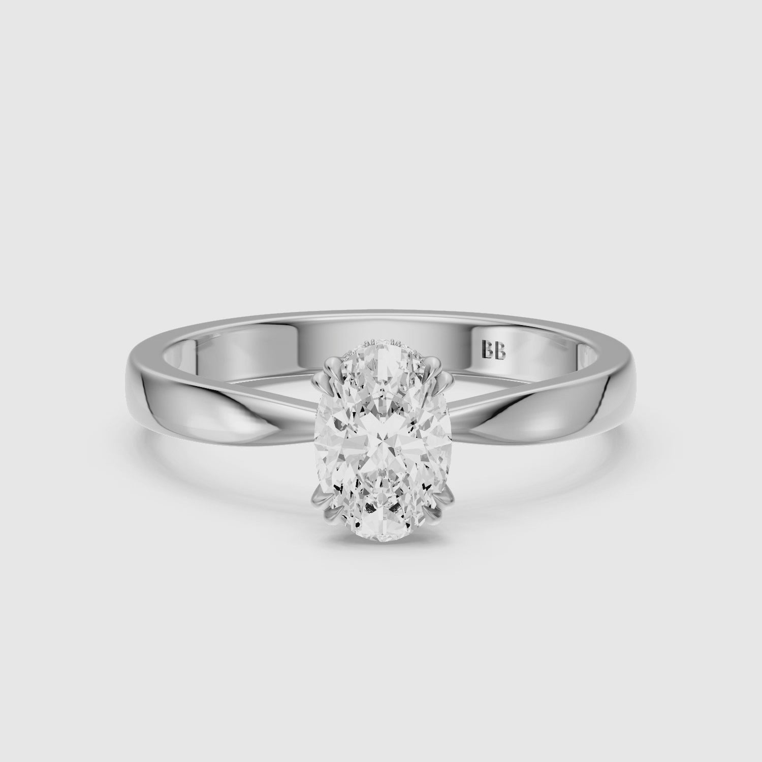 Load video: Jamie Oval Hidden Halo Lab Grown Diamond Ring with Double Claw Prongs
