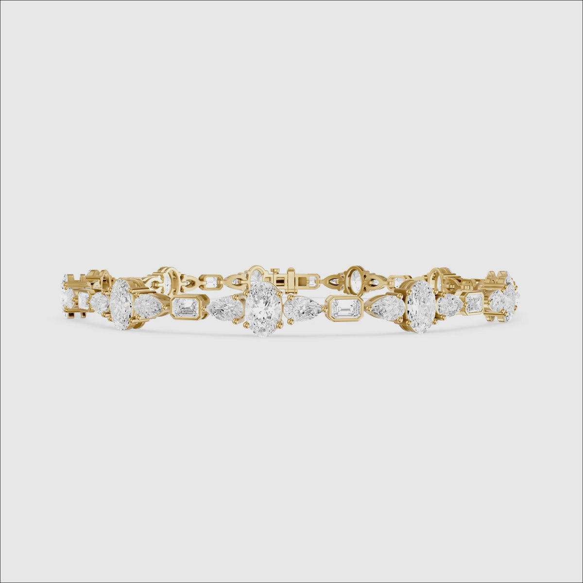 Load video: Remy Pear Oval with Bezeled Emerald Cut Lab Grown Diamond Tennis Bracelet