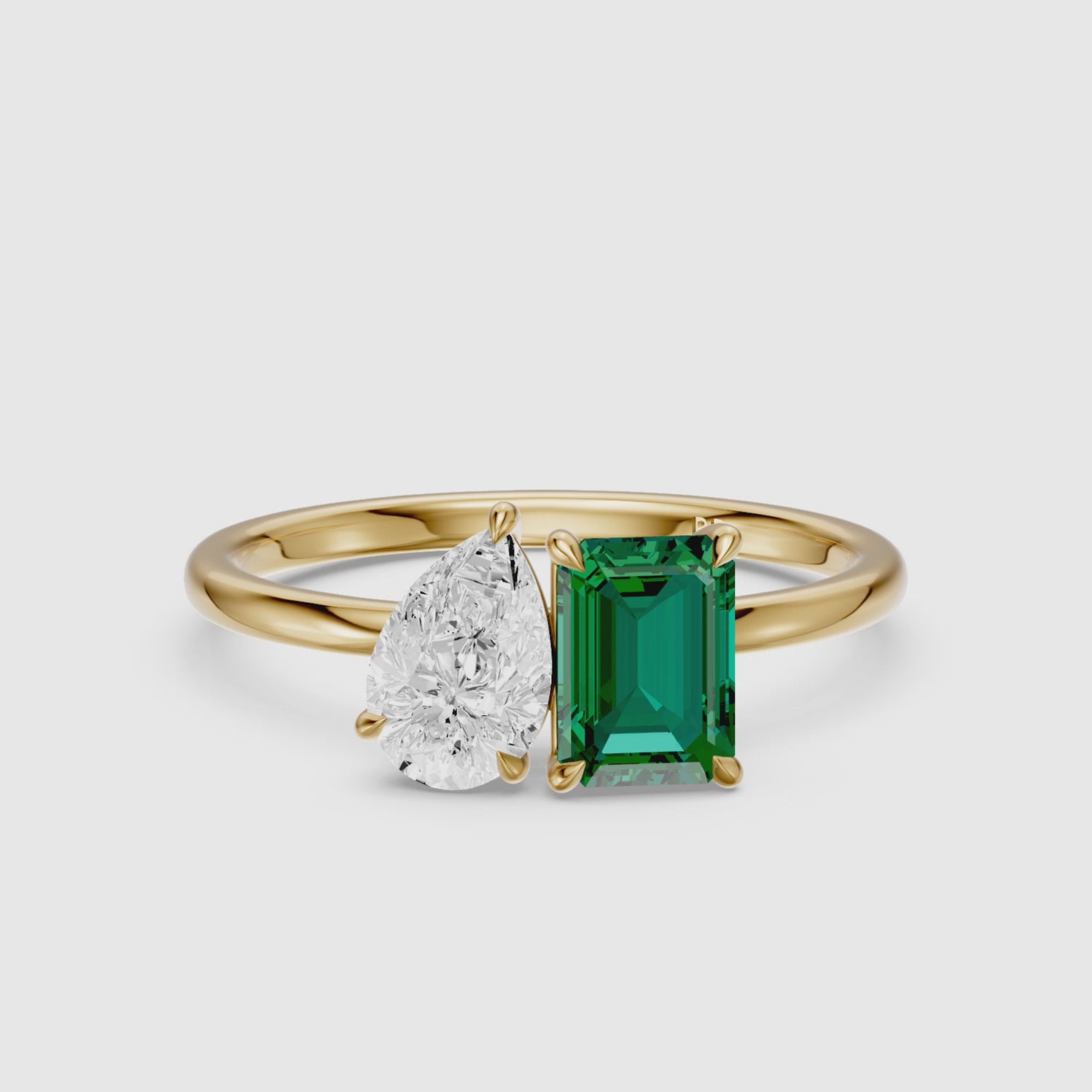 Load video: Belle Green Emerald Cut and Pear Shape Color Lab Grown Diamond Toi et Moi Ring