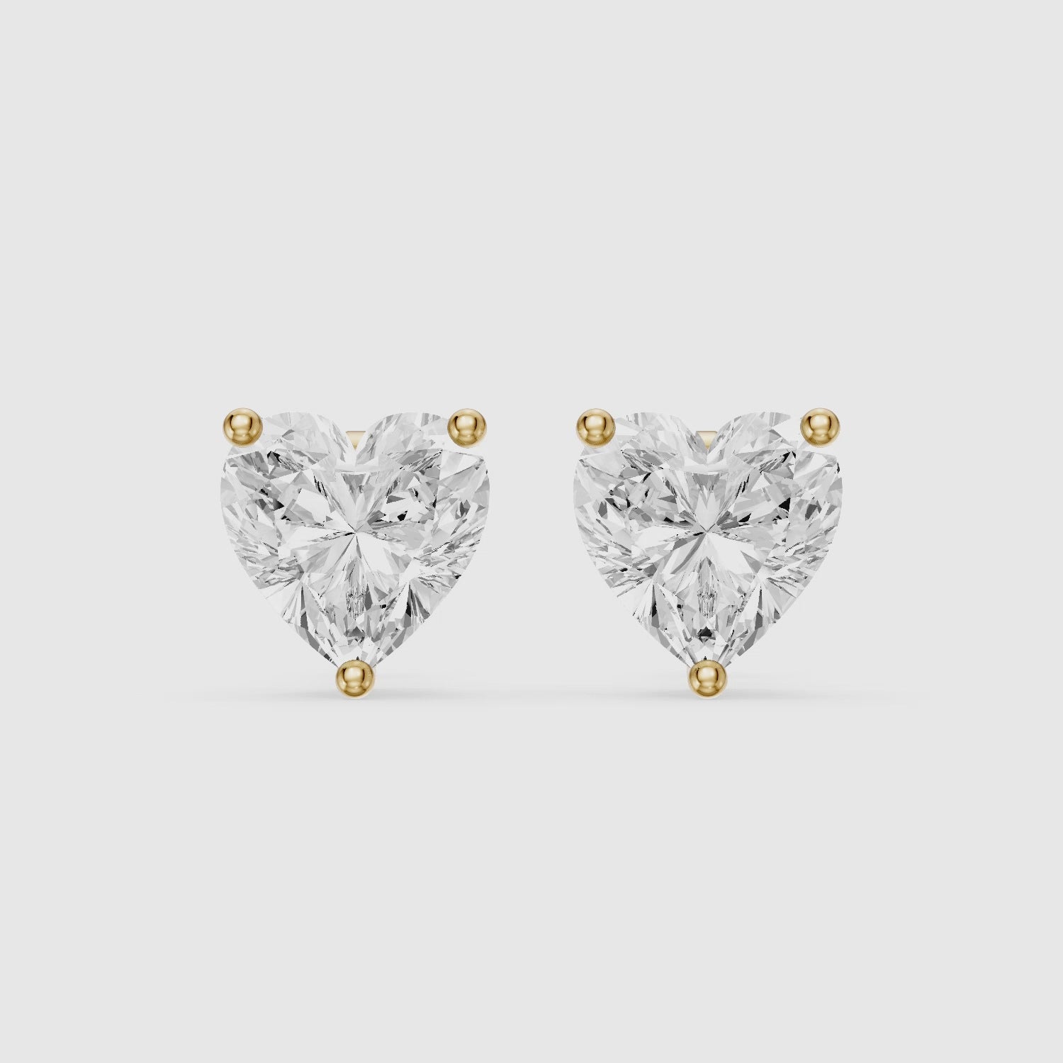 Load video: Cristina Heart Shape Lab Grown Diamond Solitaire Stud Earrings