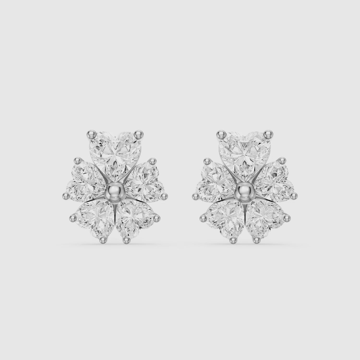 Load video: Ute Heart Cut Lab Grown Diamond Cluster Flower Stud Earrings